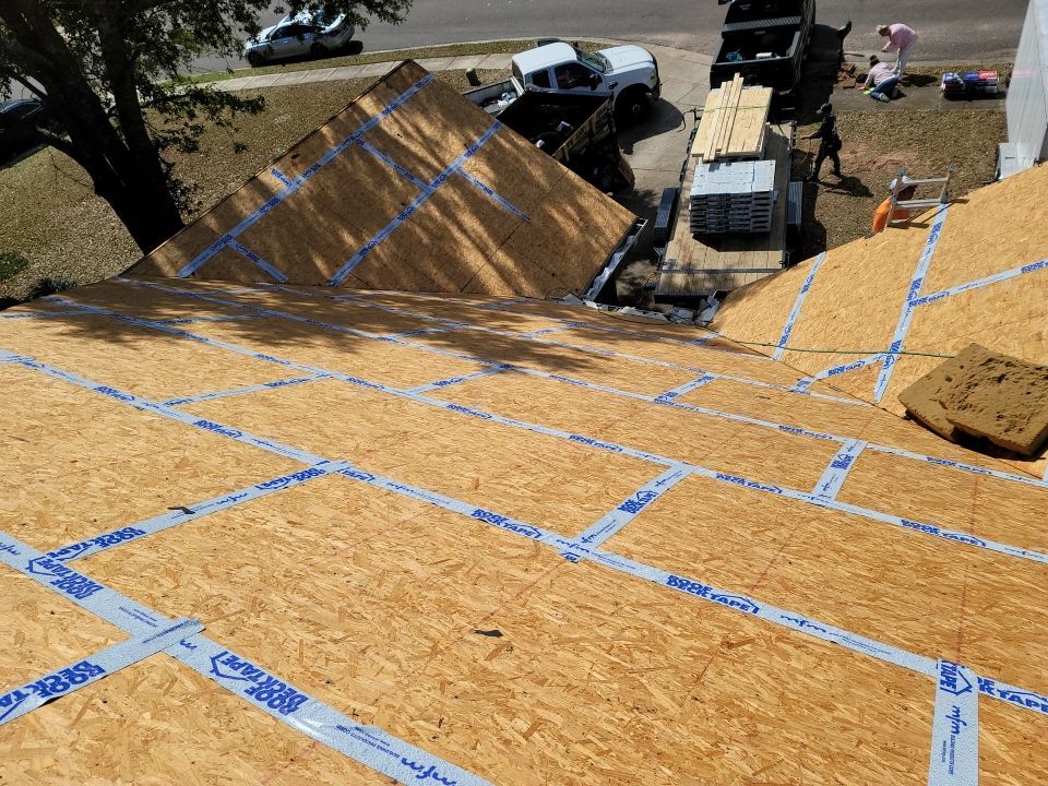 Residential Roofing Installation using Roof Replacement by American Roofing & Construction LLC
