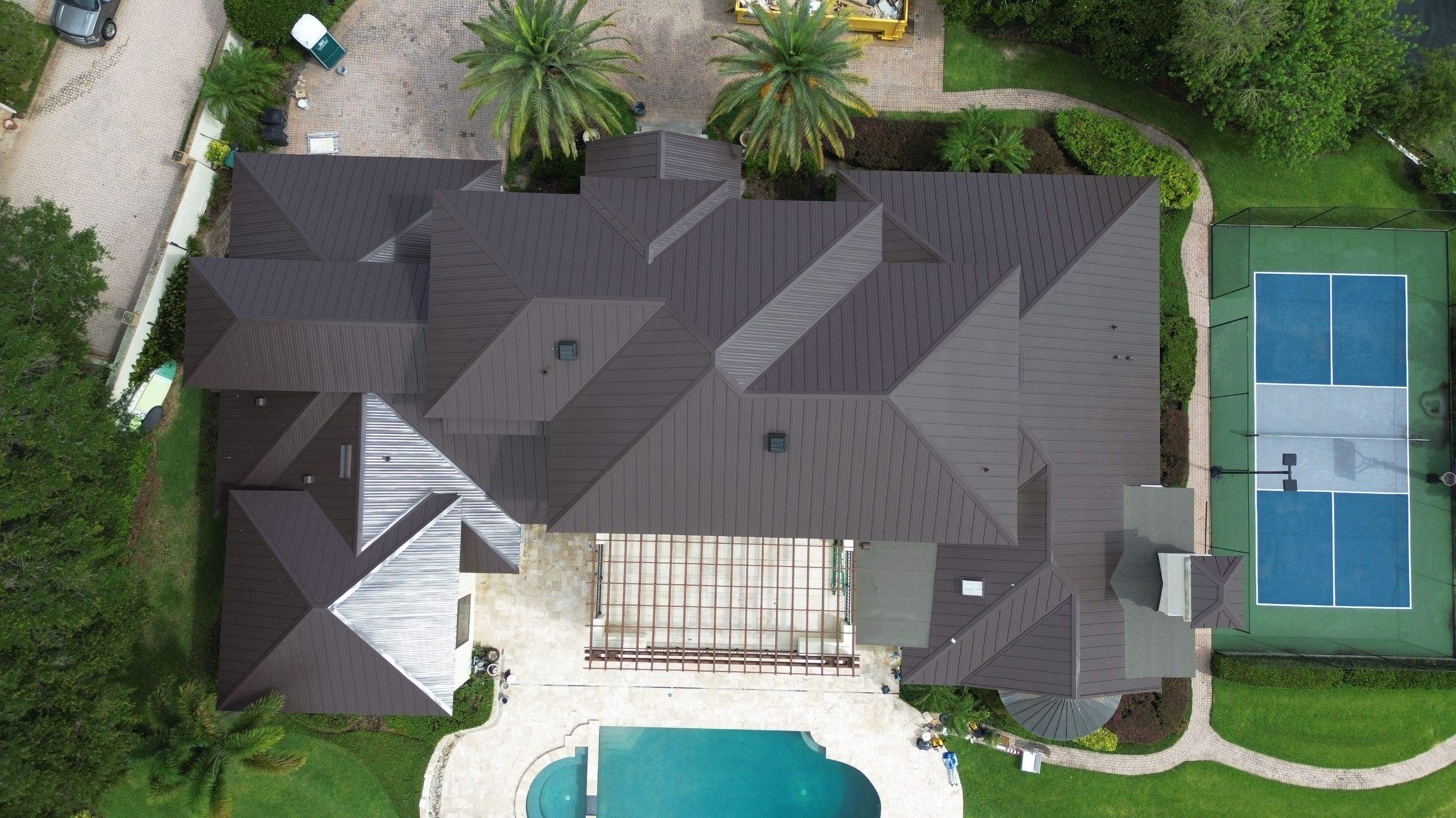 Standing seam metal roof on Lake Conway FL by Gold Key Roofing