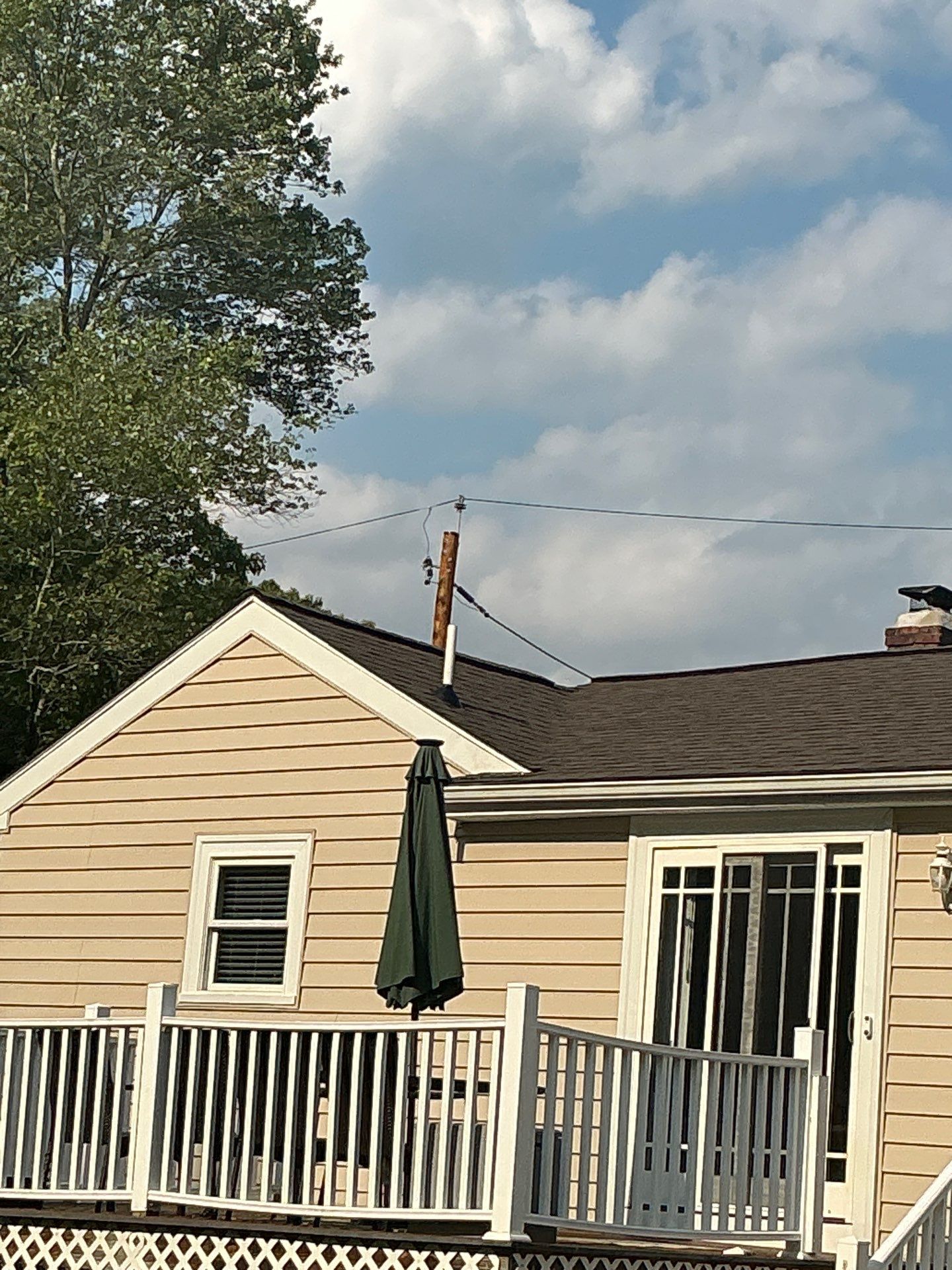 Full Roof Replacement & Chimney Repair – Onyx Black, MA by Mighty Dog Roofing of Greater Middlesex County