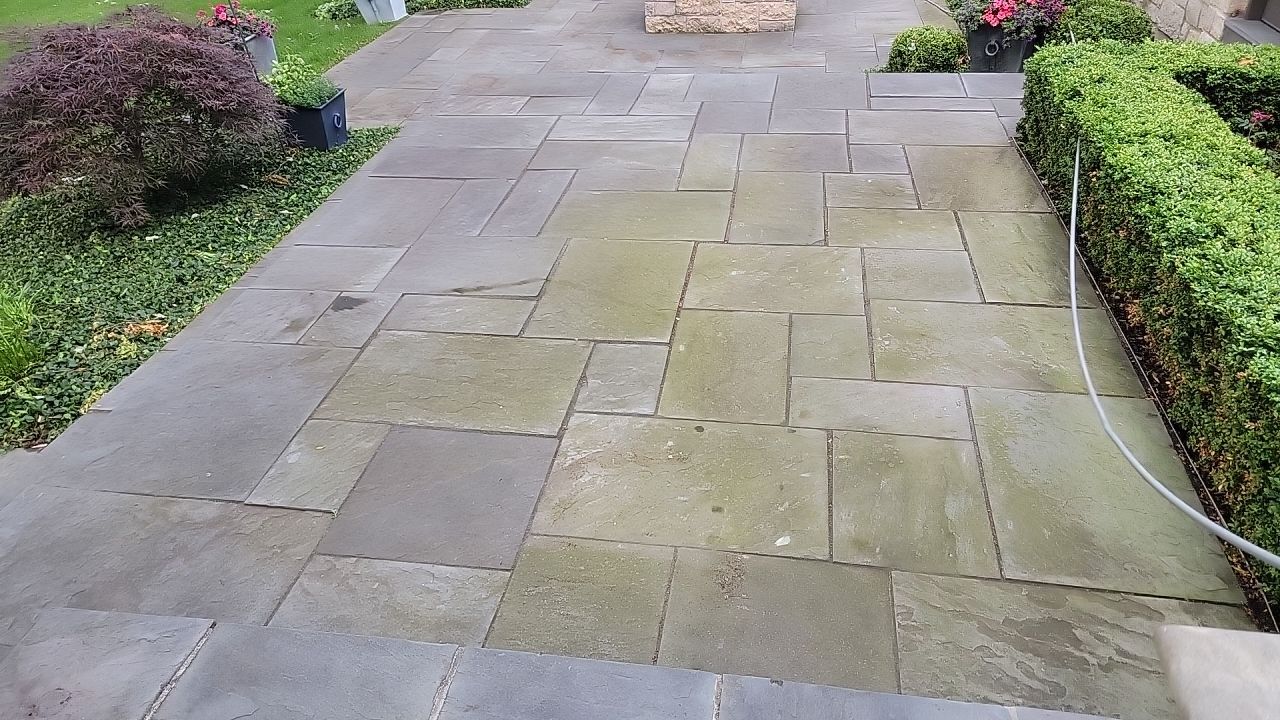 Northbrook, IL stucco home soft wash and stone cleaning by Northern Power Washing LLC.