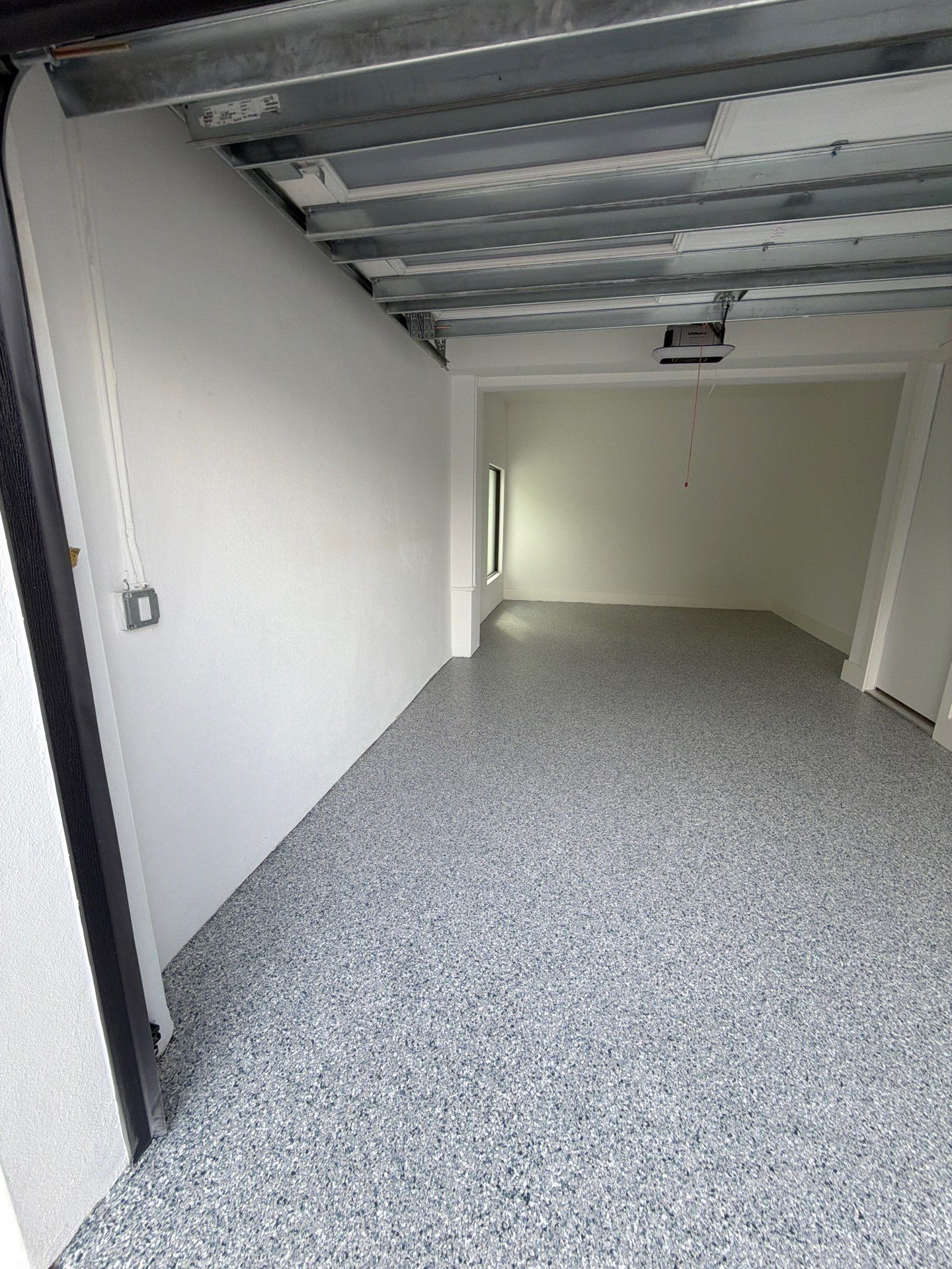Residential Garage Floor Preparation and Epoxy Coating in Dunedin by Performance Floors & Coating