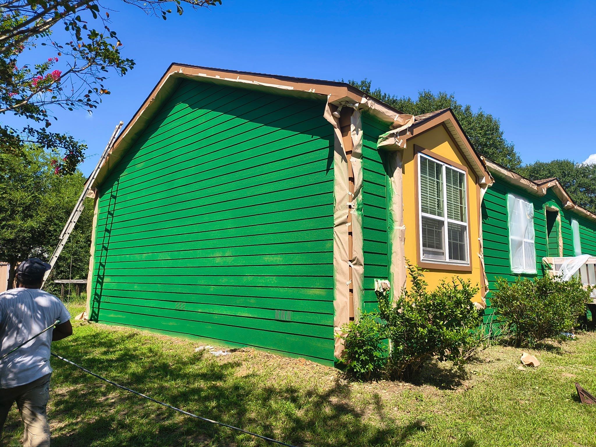 Exterior Painting in Lindale, TX | Bright Green Wood House Repaint by Quality Coats Painting