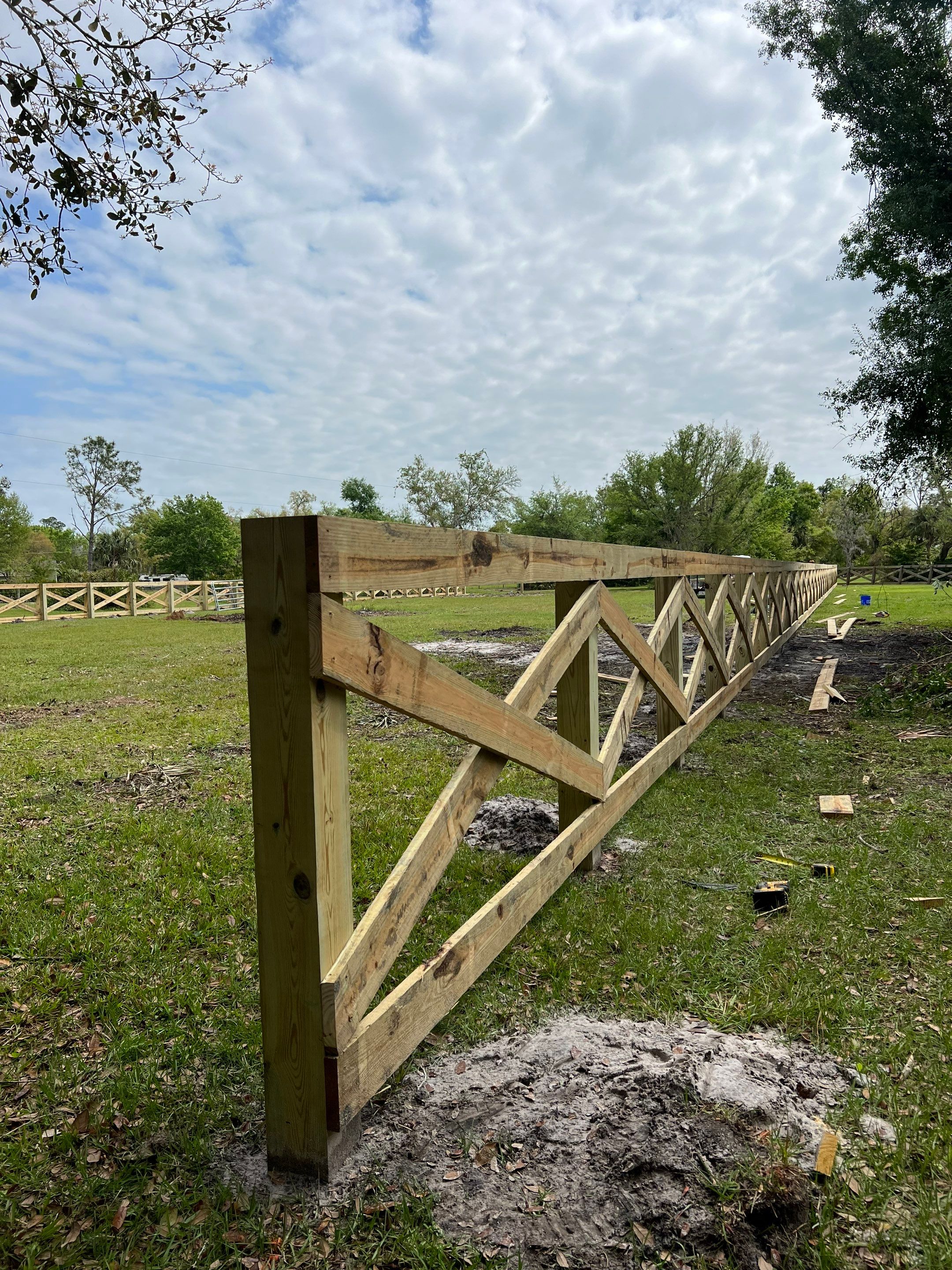 Wood Fence Installation using 4FT Cross Buck  by Asap fence and gates, LLC