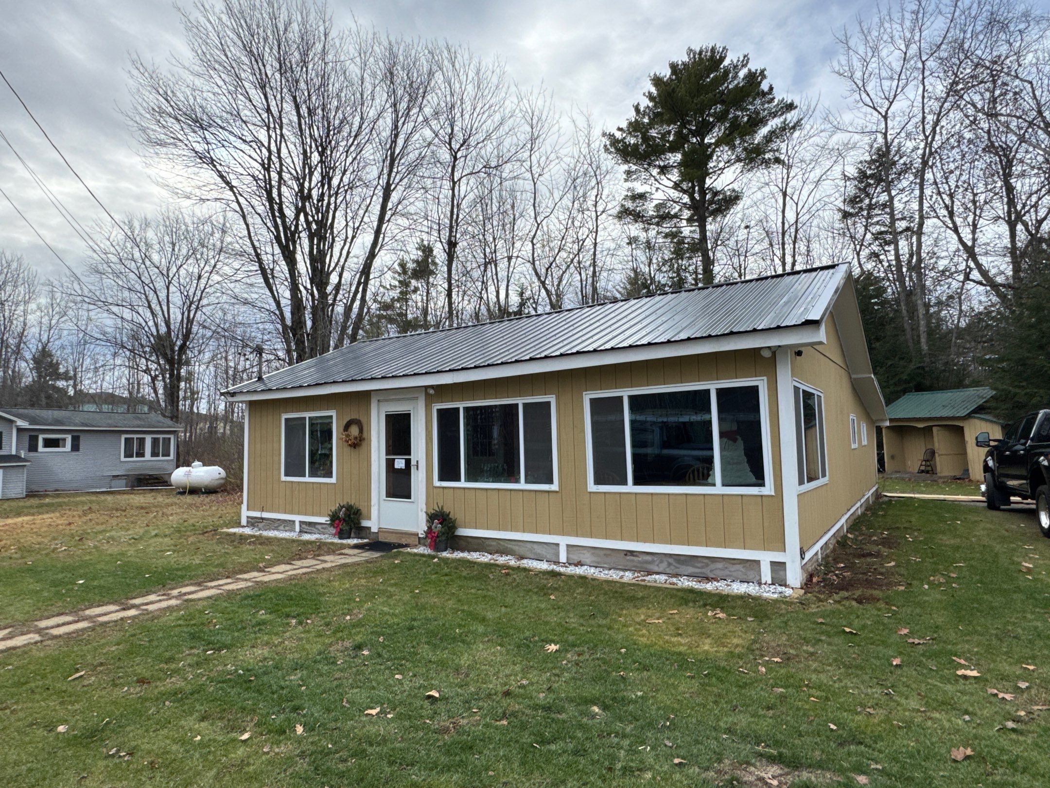 Gilford, NH Metal Roof Installation on Lake Winnipesaukee – Screw-Down Metal Roofing System by Compass exteriors