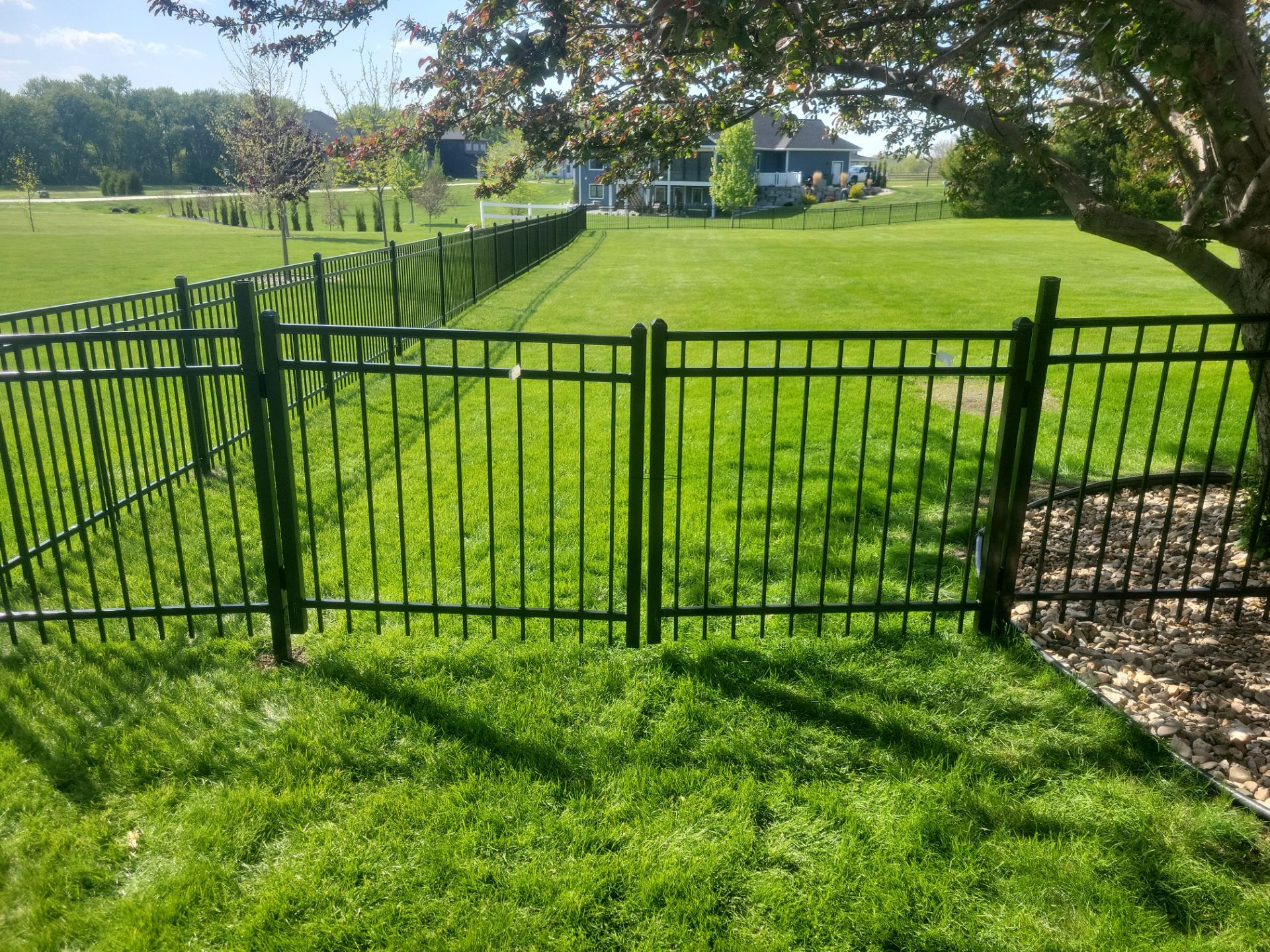 Black Ornamental Metal Picket Fence Installation in Waterloo by Perfect Picket Fence and Stain