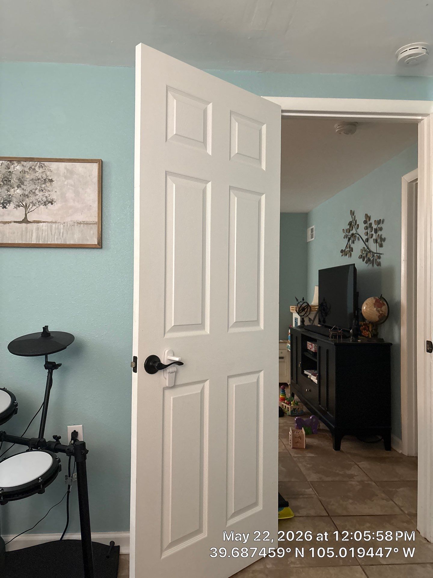 Interior Renovation Featuring New Paneled Doors and Tile Flooring by CompanyCam Sales Demo