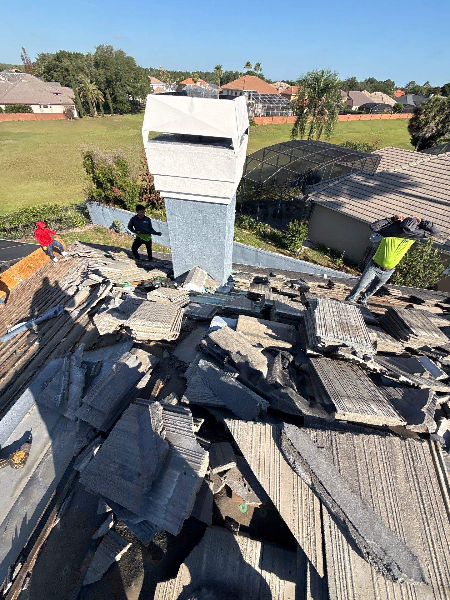 Winter Park Concrete Tile Roof Replacement and Chimney Flashing Installation by Fortified Roofing Solutions Corp.