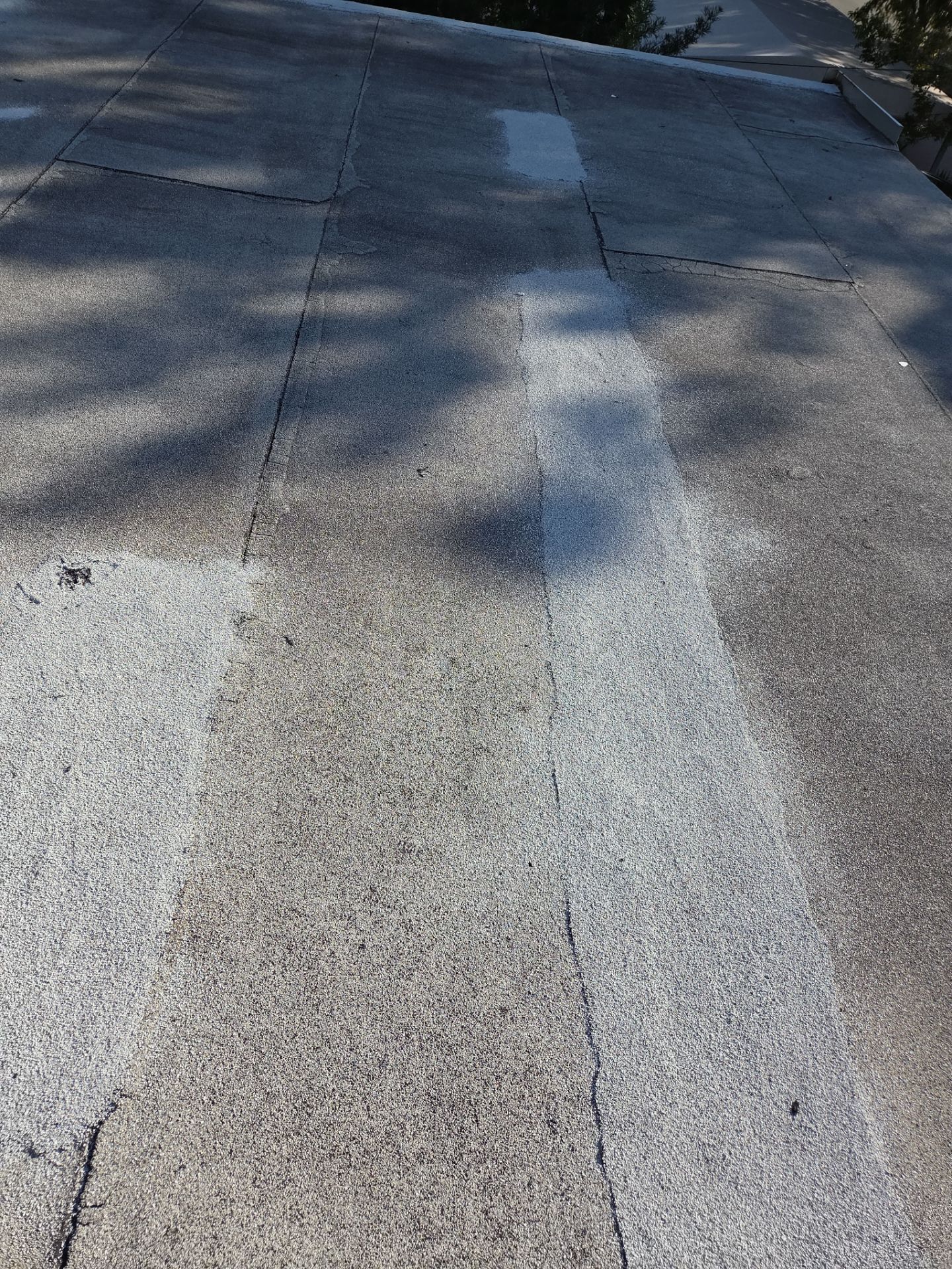 Commercial Flat Roof Restoration Using Silicone Coating in Hallandale Beach by Aastro Roofing