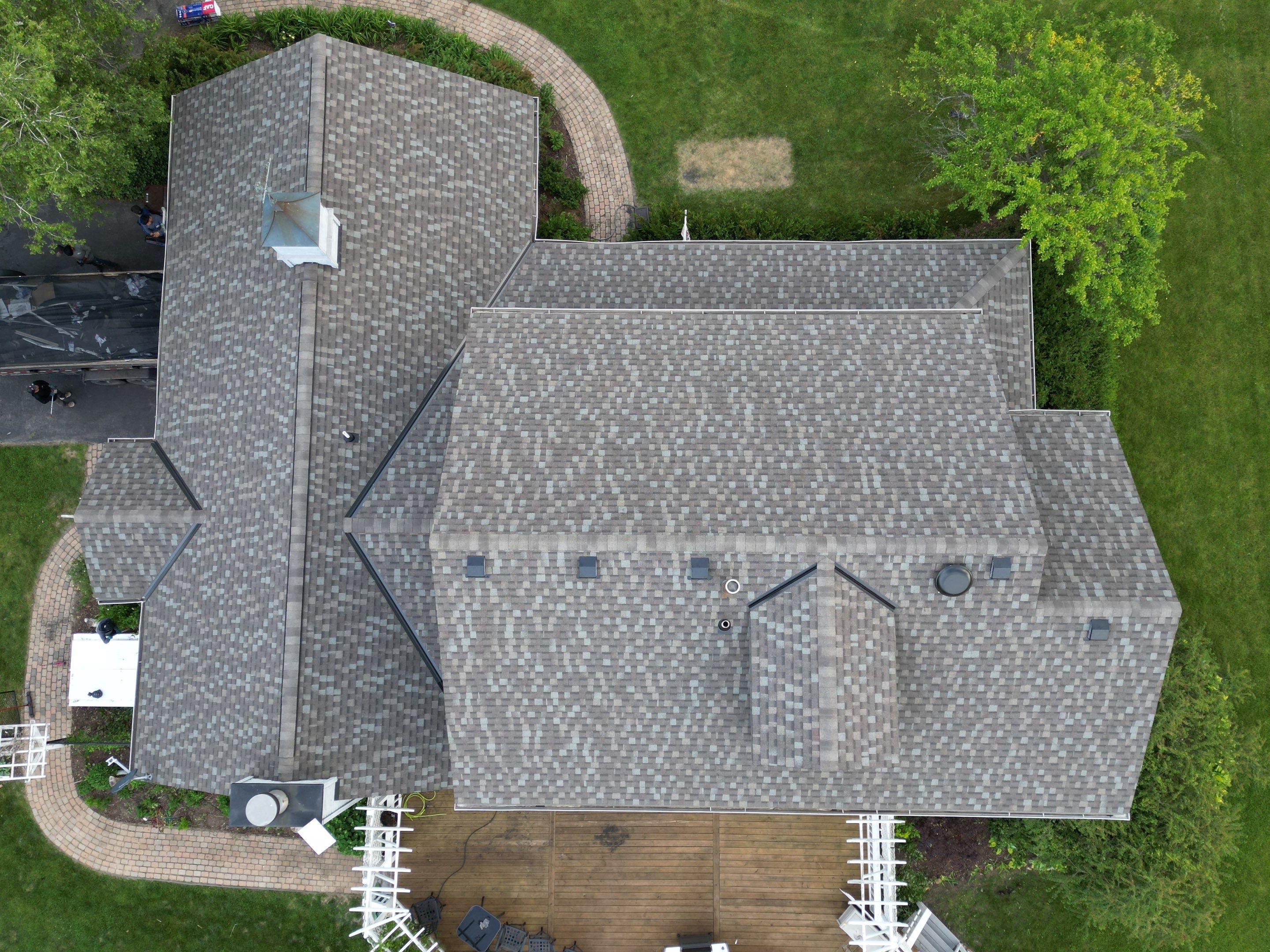Roofing, copper chimney cap and copper awning by Optimal Home Improvement 