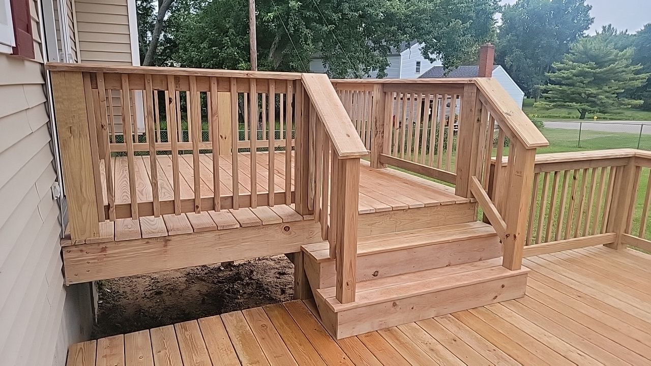 Deck Installation using Treated Lumber by Avalon Roofing and Exteriors