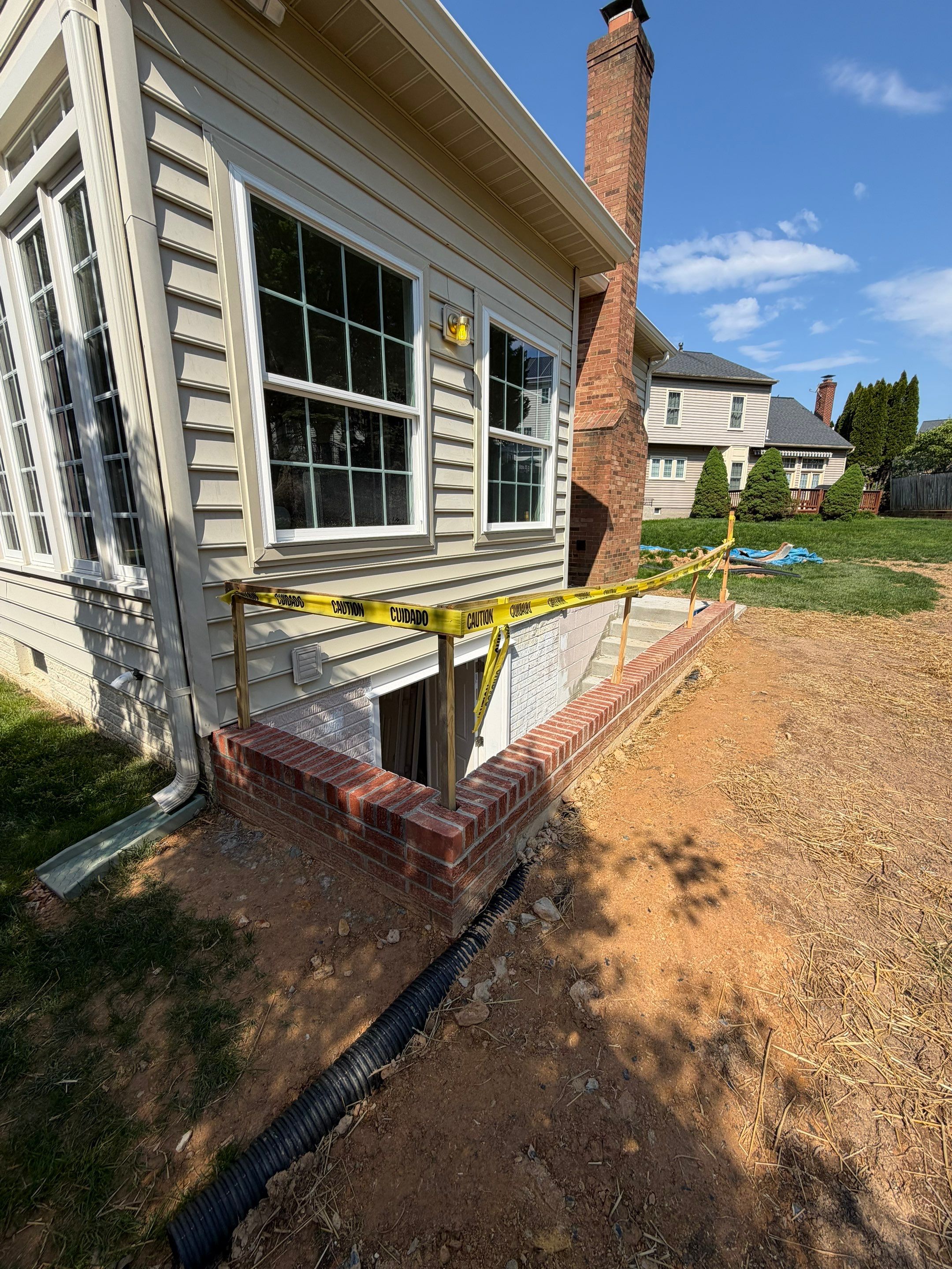 Basement Stairwell and Window Well Railing Installation in Germantown by Capitol Iron Works