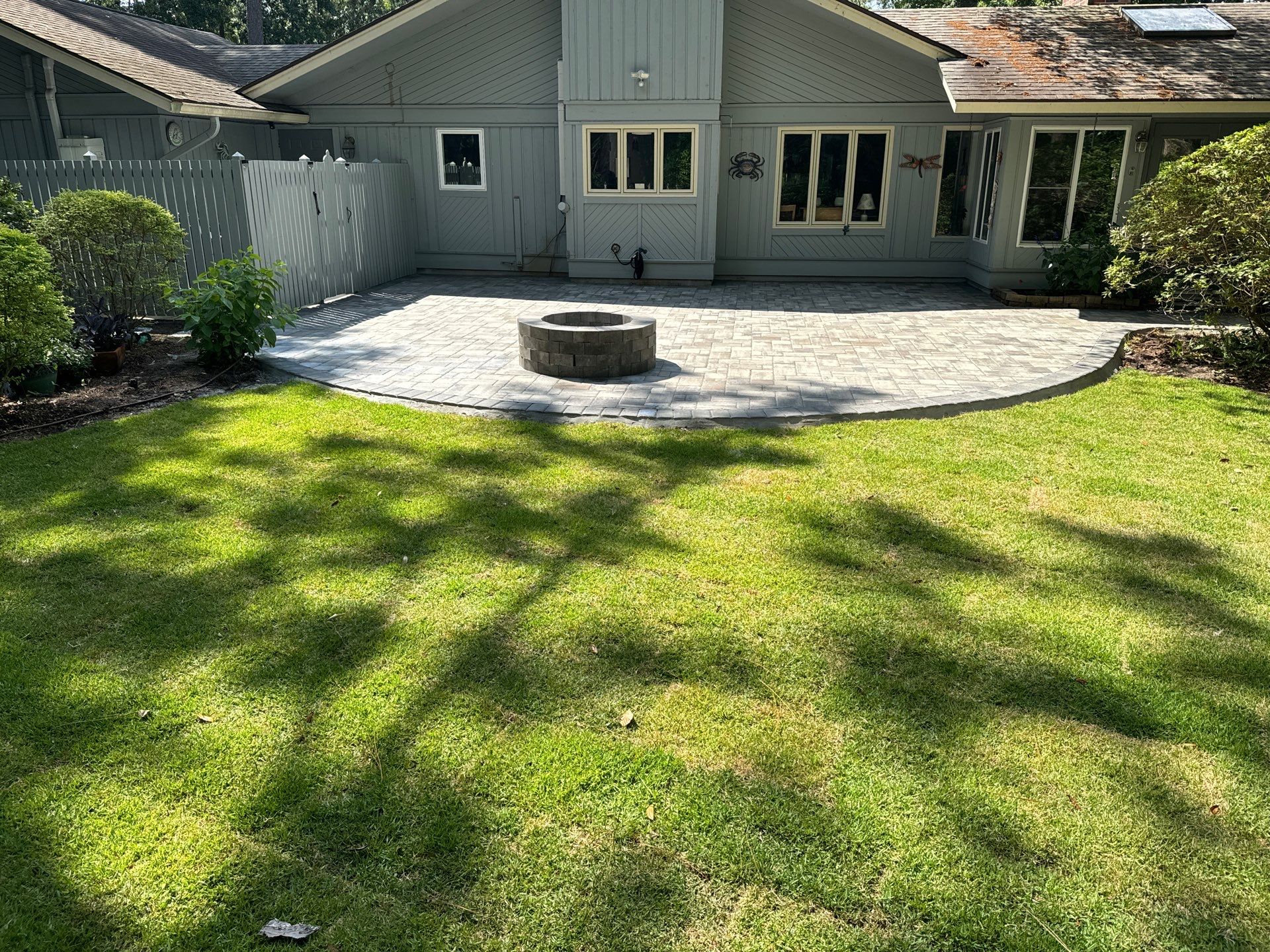 Custom Gray Paver Patio and Fire Pit Installation in Hilton Head Island by Lowcountry Scapes, LLC