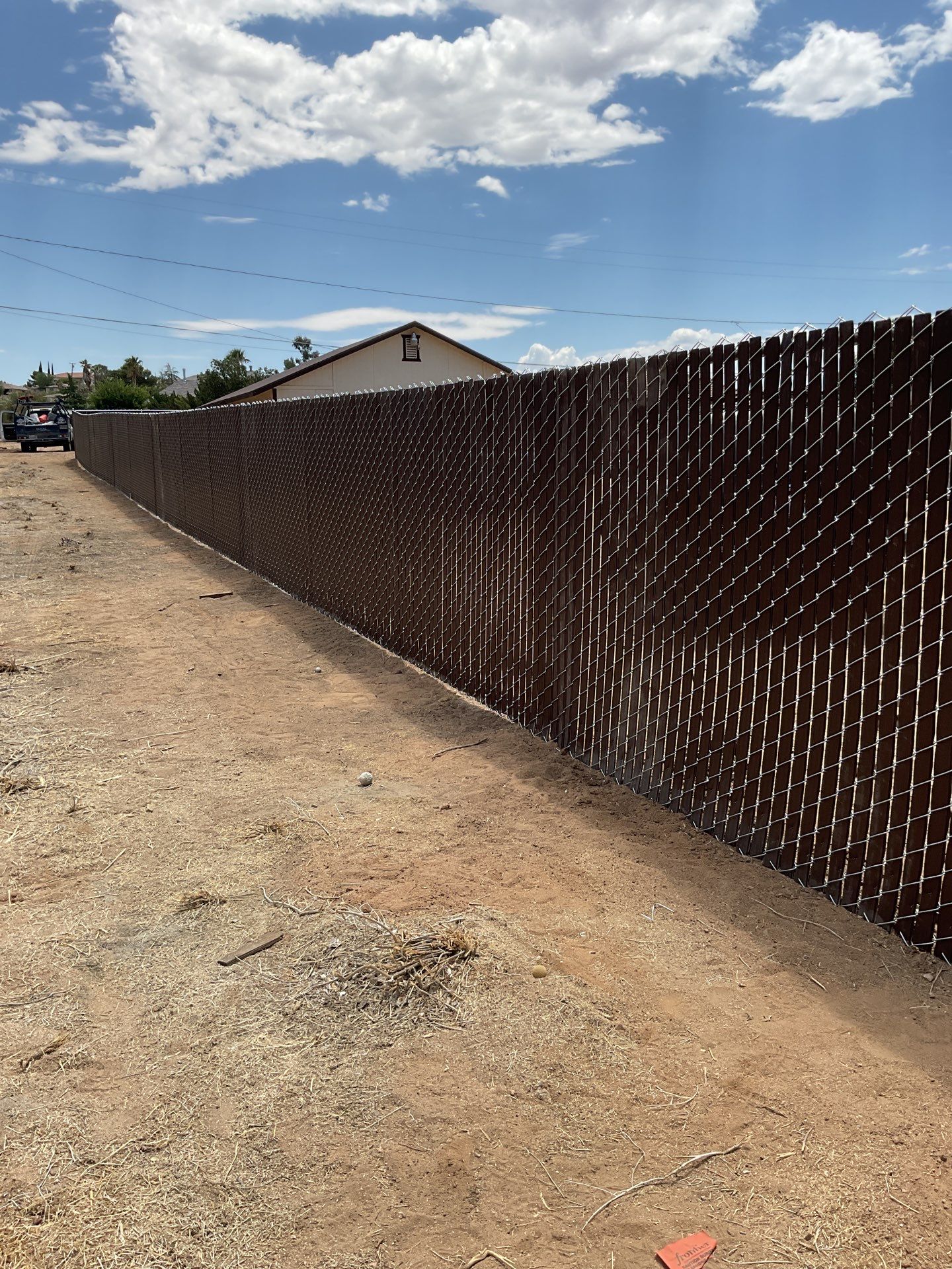 Dark Brown Privacy Chain Link Fence by Fence Guys Inc.