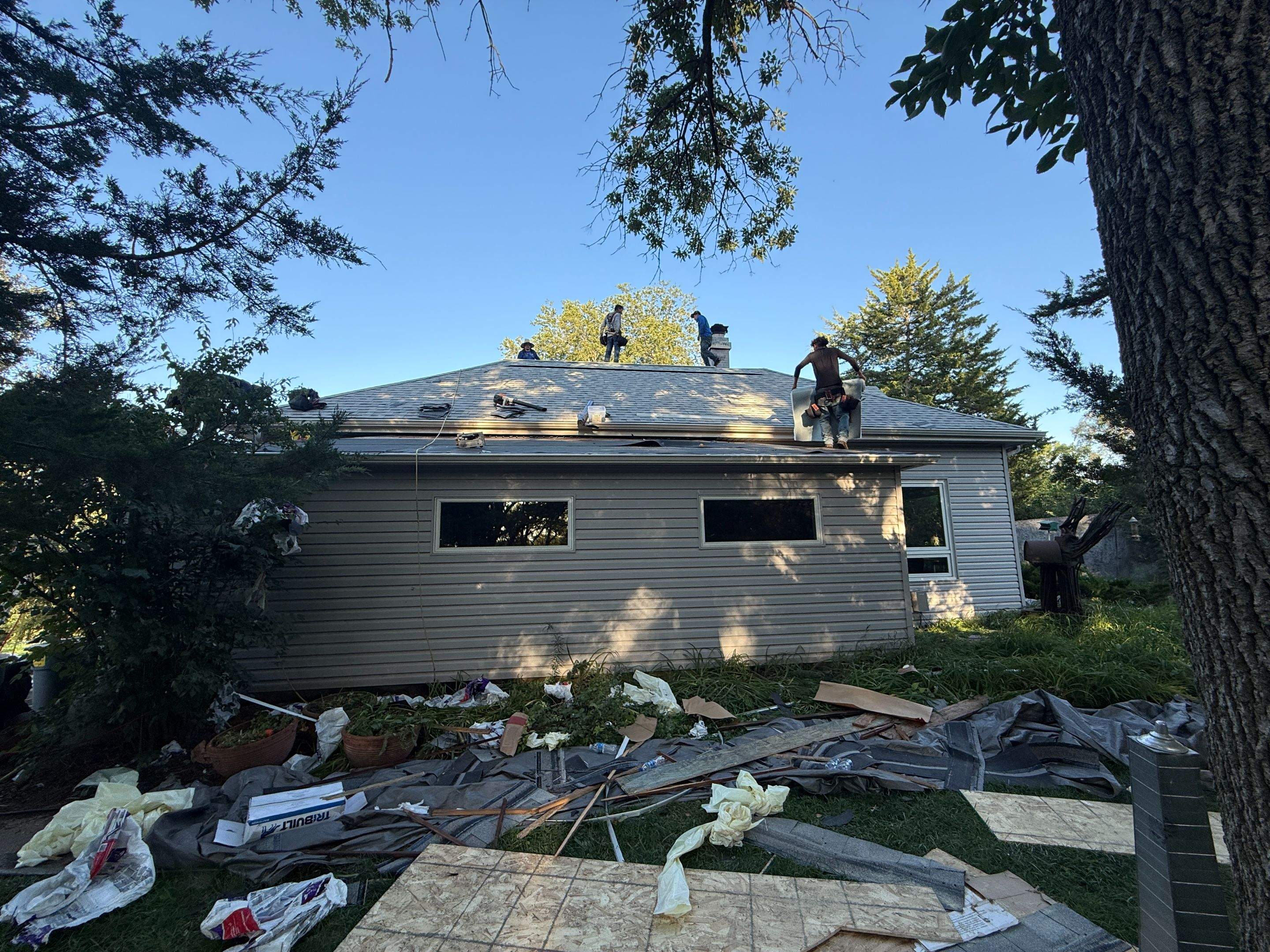 Asphalt Shingle and EPDM Membrane Roof Installation in Mineola by Star Home