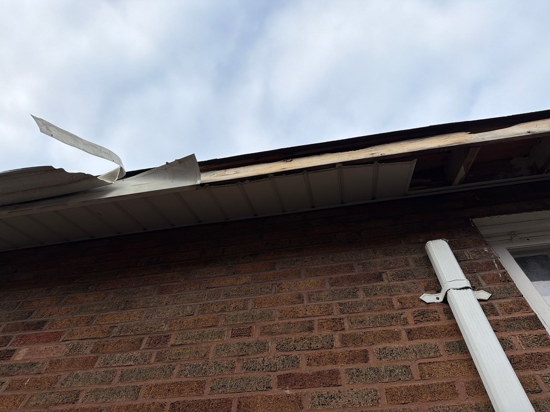Holly Hills Storm Restoration: Soffit Repair & 6" Gutter Upgrade (South St. Louis) by Acute Roofing And Exteriors