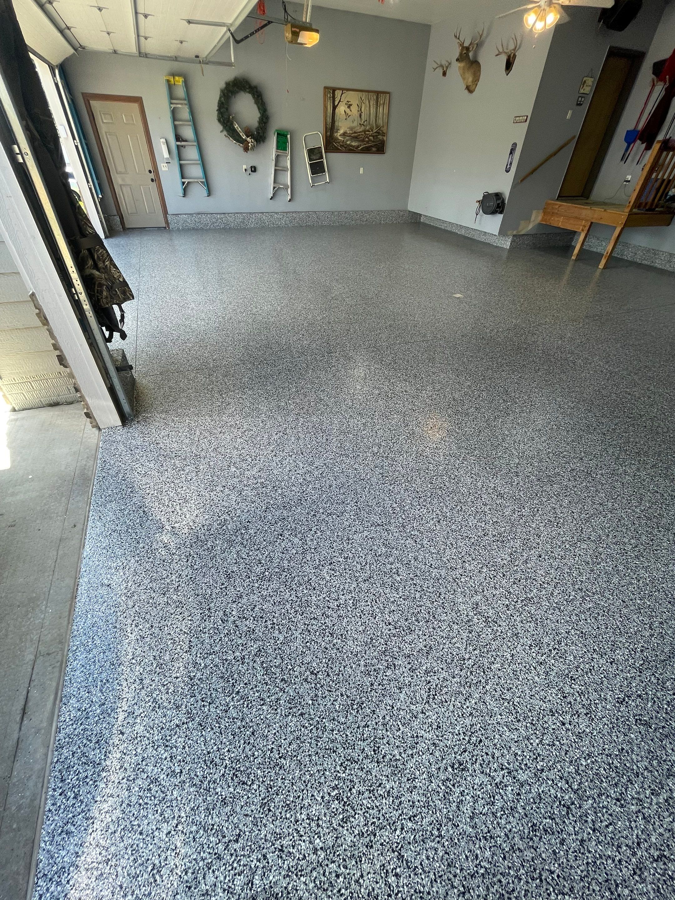 Residential Garage Floor Coating in Sioux Falls by Select Painting, Coatings & Garage Cabinets