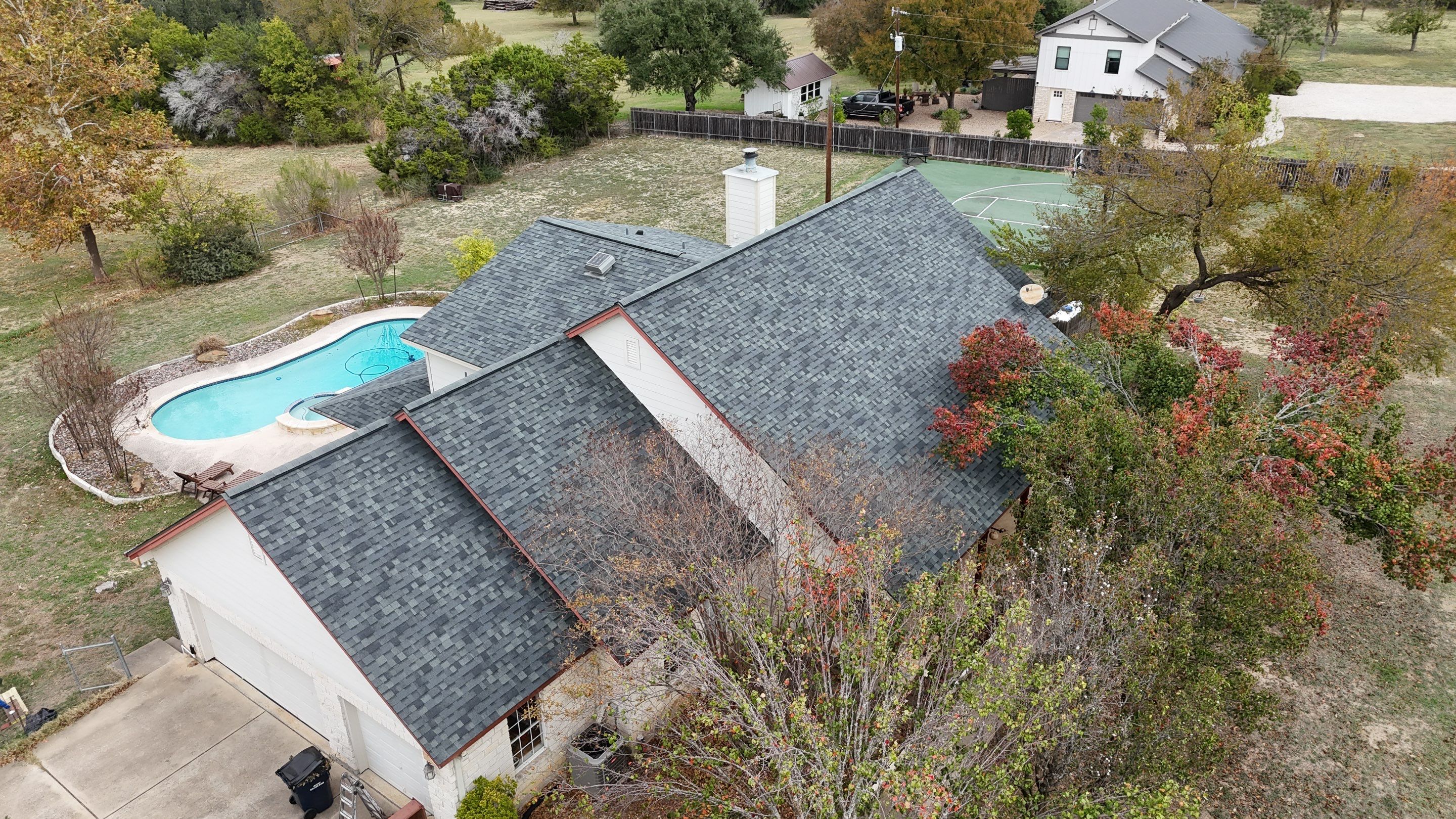 Residential Roof Replacement using Owens Corning - Oakridge - Estate Grey by Action Exteriors Austin