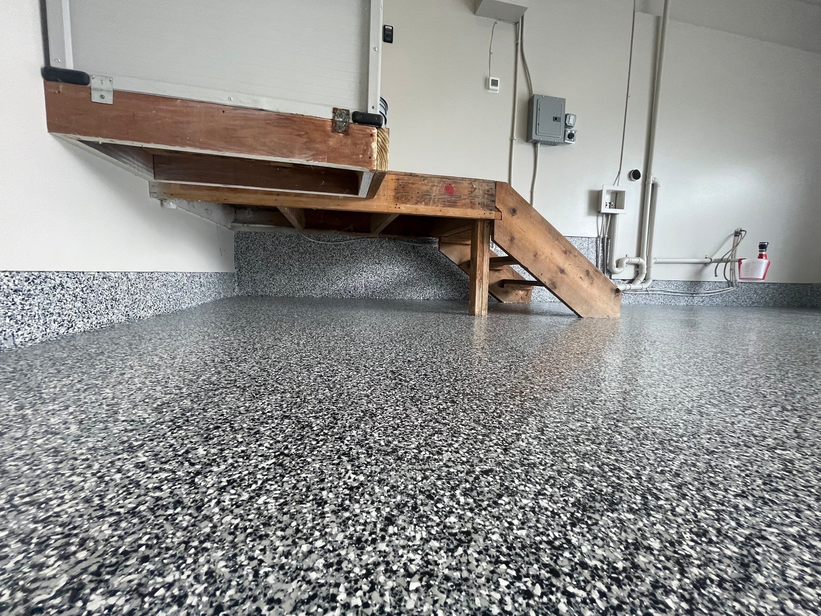 Domino Flake Floor Coating and Crack Repair in Chancellor by Select Painting, Coatings & Garage Cabinets