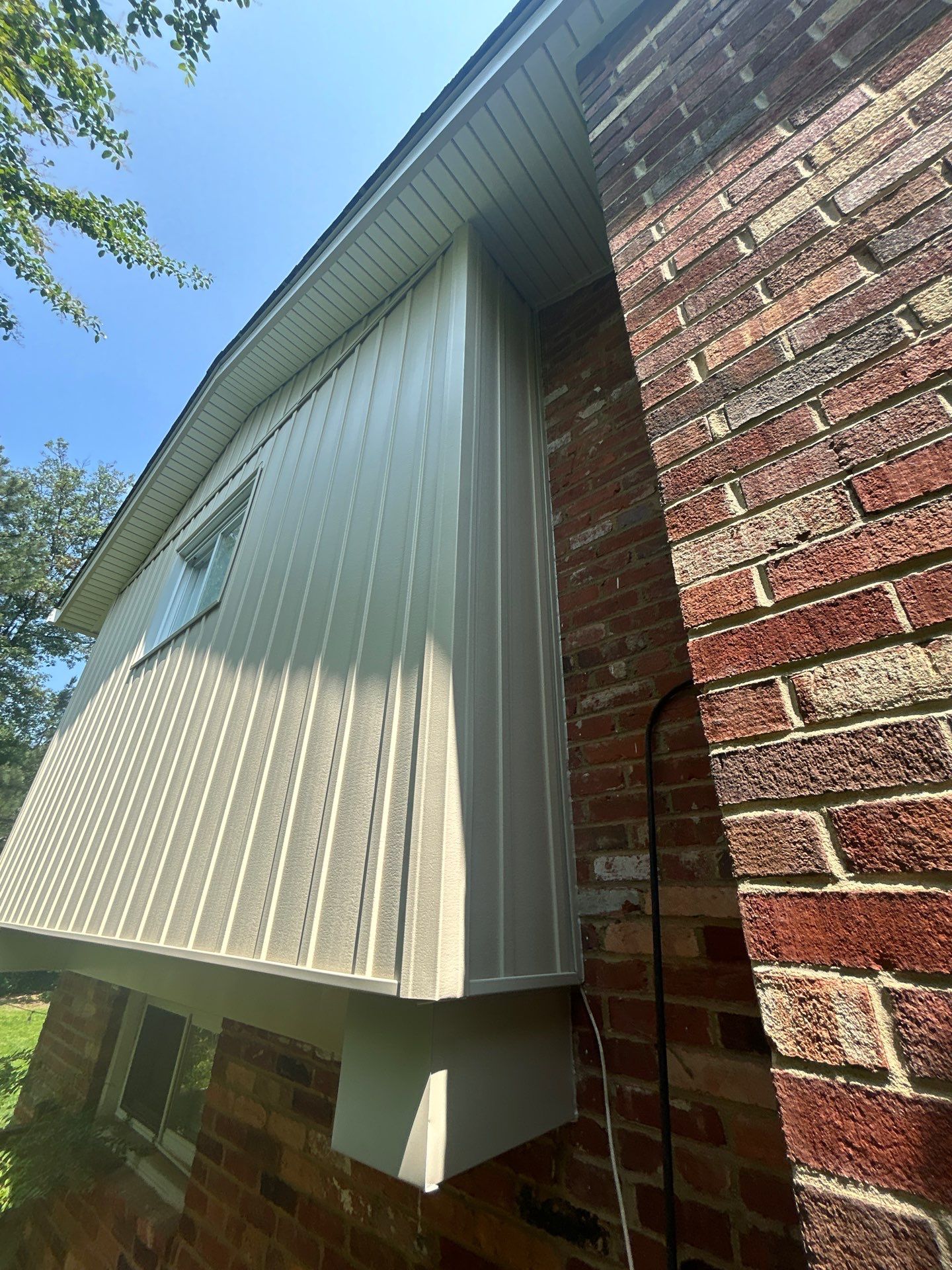 Fairfax: Residential Siding Replacement with CertainTeed 8" Board and Batten Siding in Desert Tan by RM Banning, Inc.