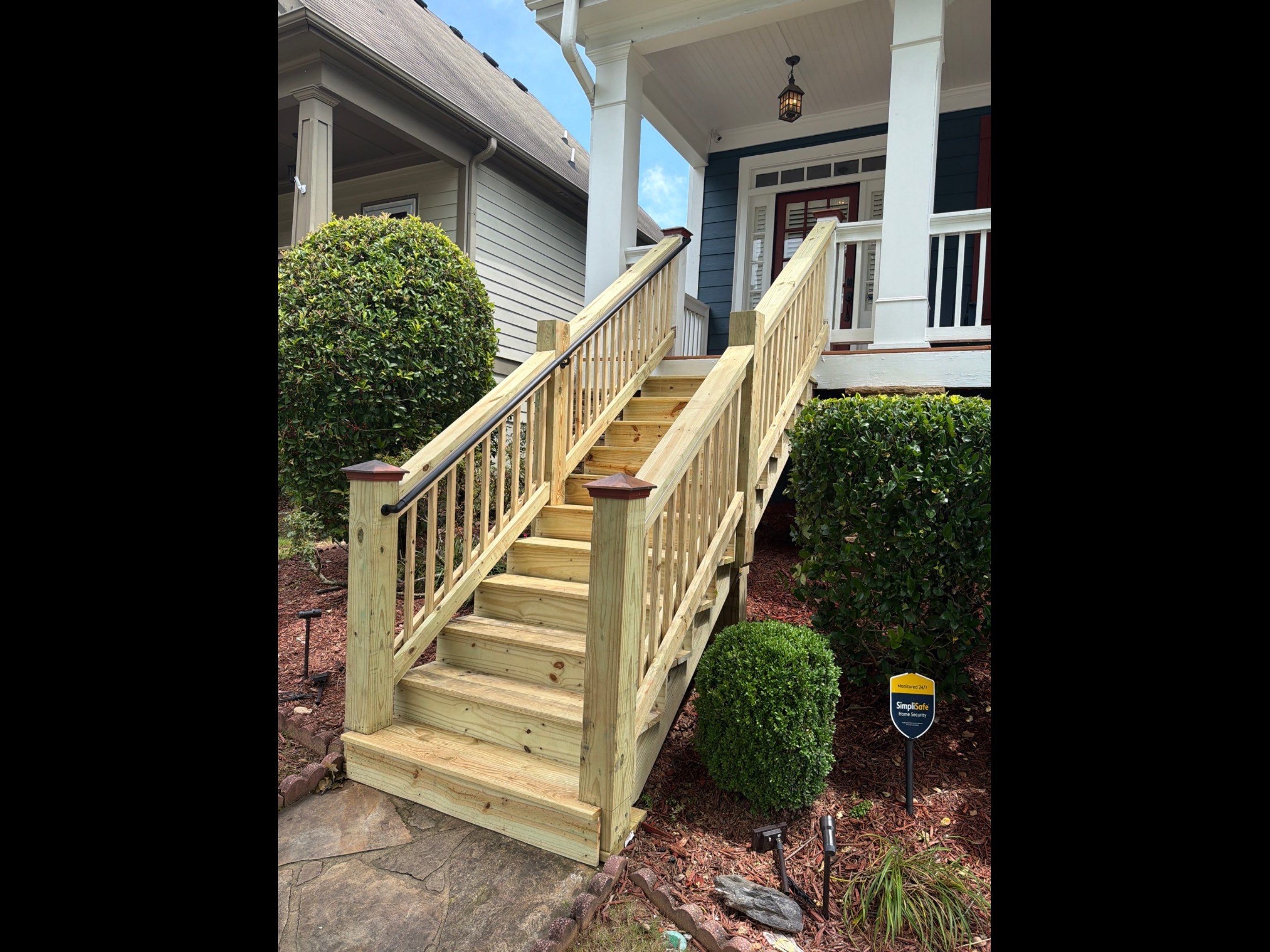 Pressure-Treated Wood Front Porch Stair Reconstruction in Atlanta by Swift Home Renovations