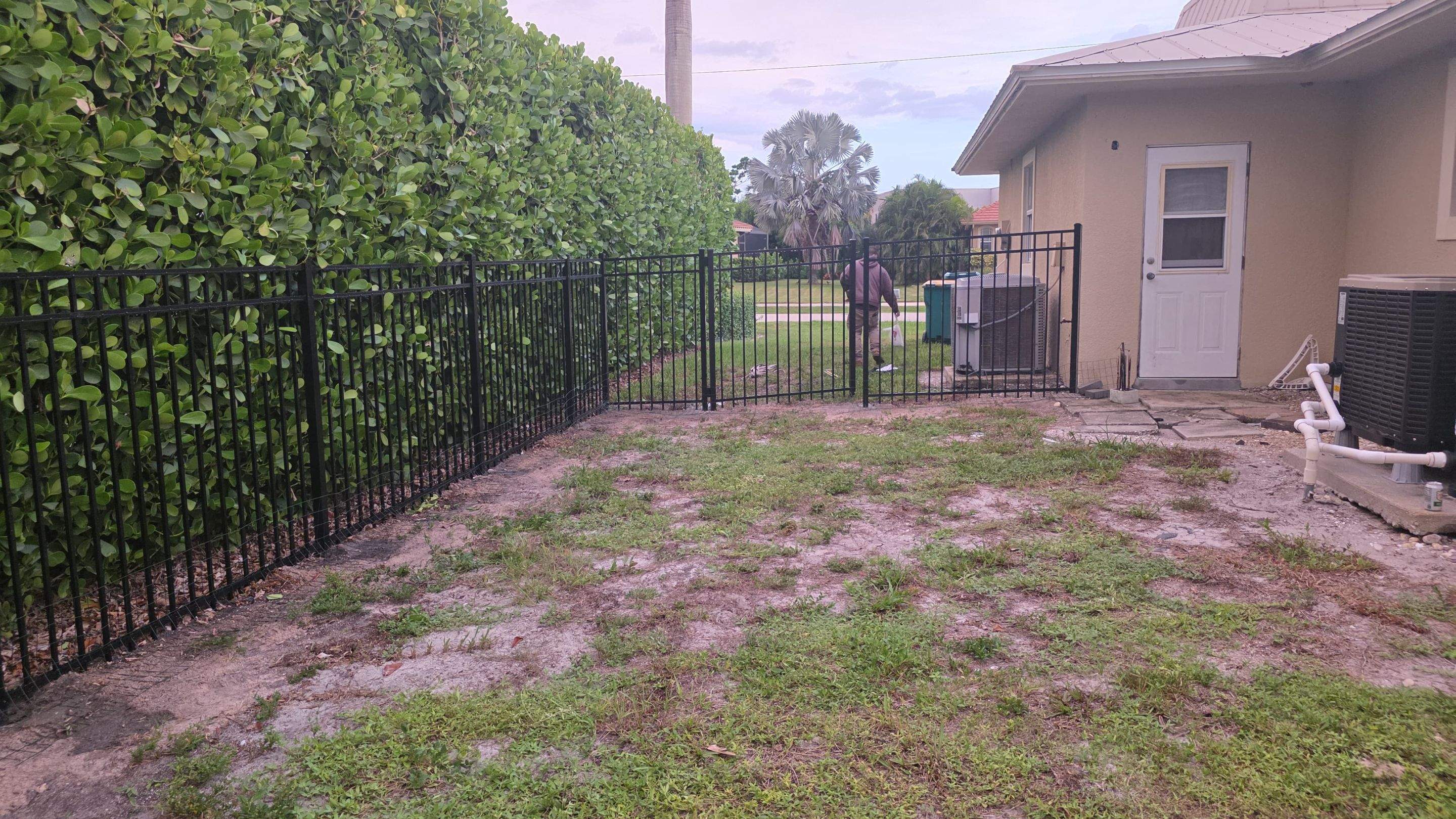 Black Aluminum Picket Fence Installation in Marco Island by True Fence LLC