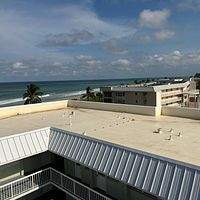 .032 Aluminum 1.5" Mechanical Seam Regal White by Total Roofing System The Metal Roof Experts