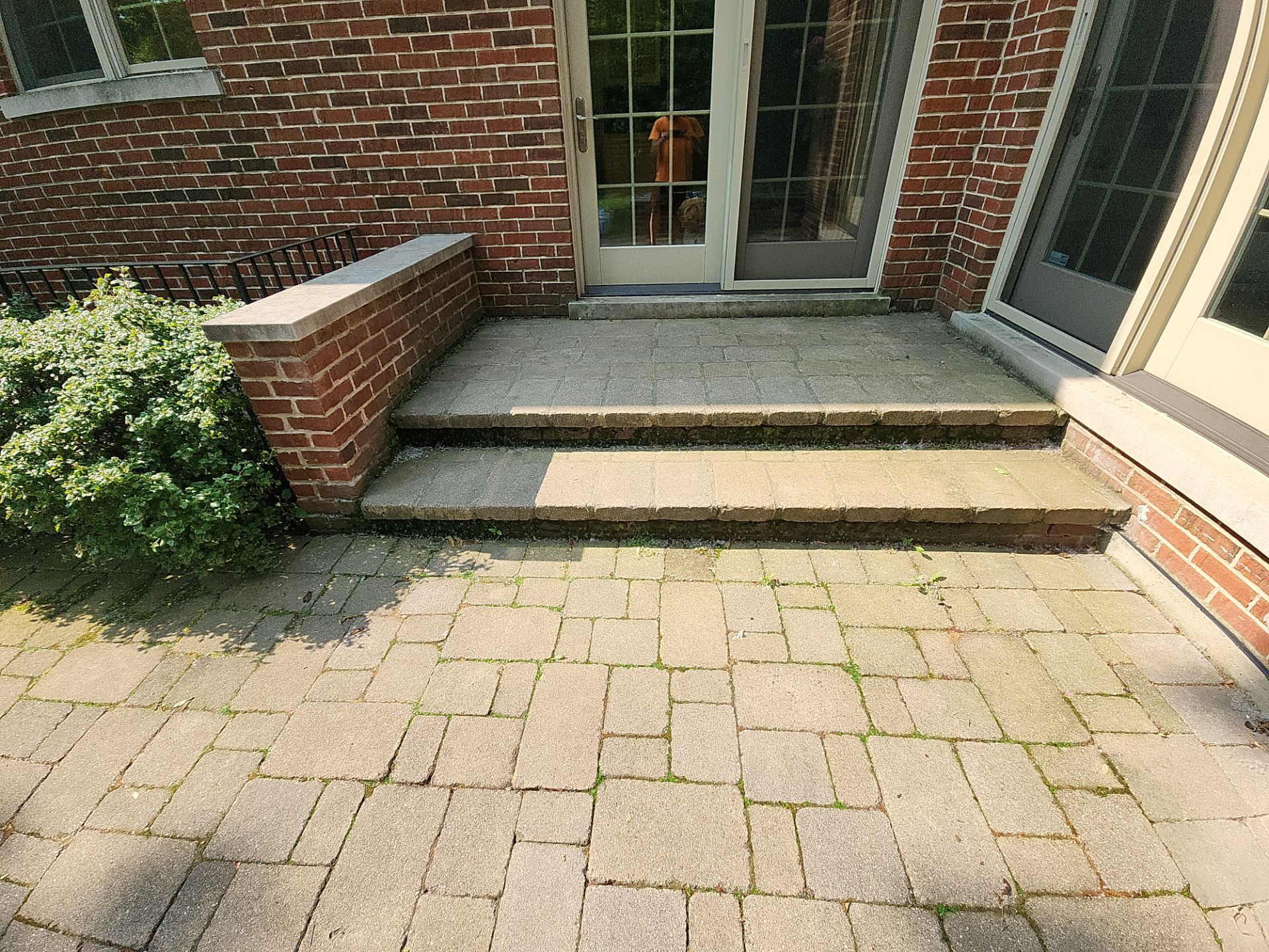 Brick paver repair, clean, seal and poly sanding by Northern Power Washing LLC.