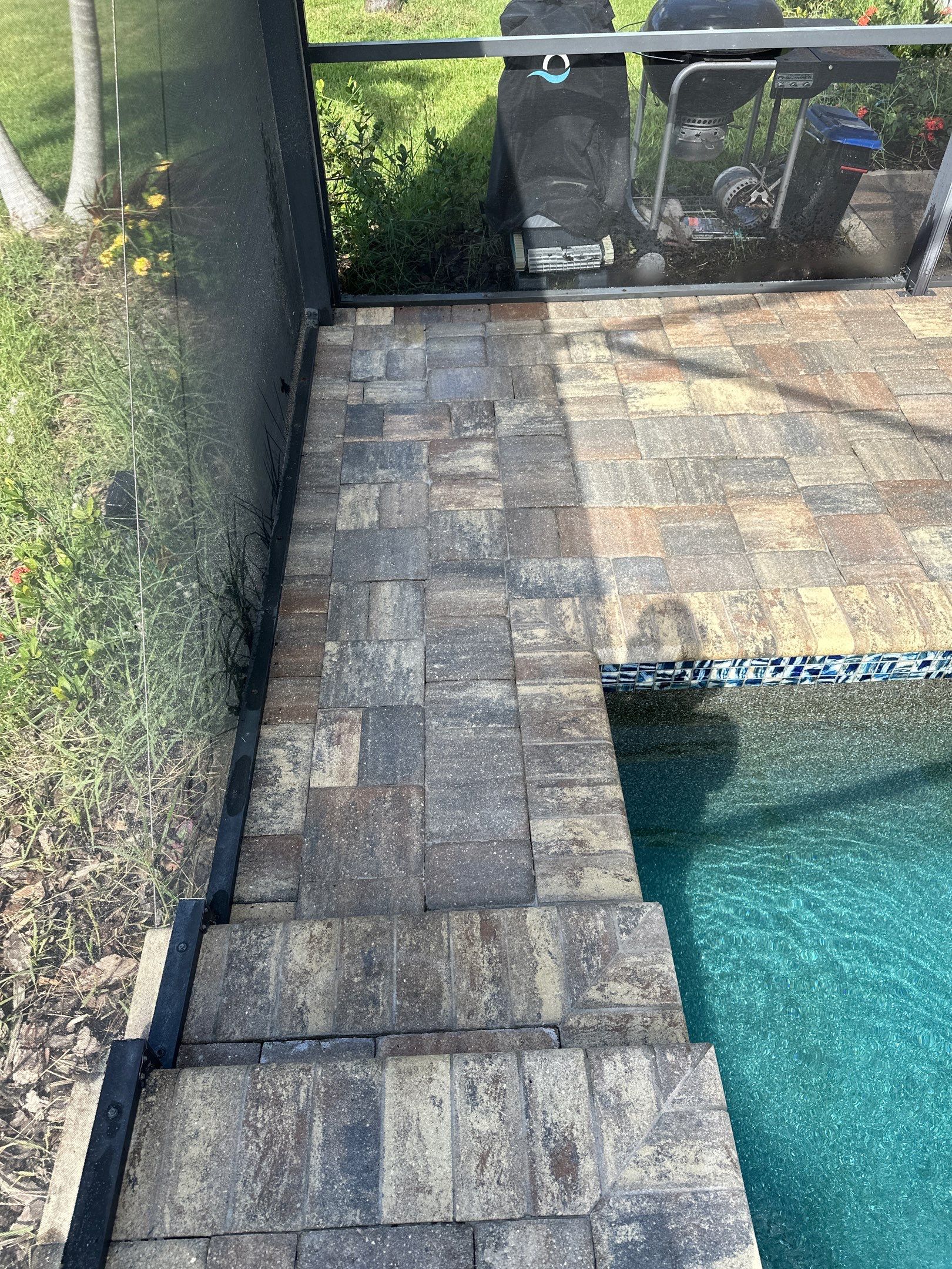 Paver Driveway, Sidewalk, and Pool Deck Cleaning in Winding River Community, Bradenton, FL by Sunshine AquaWash