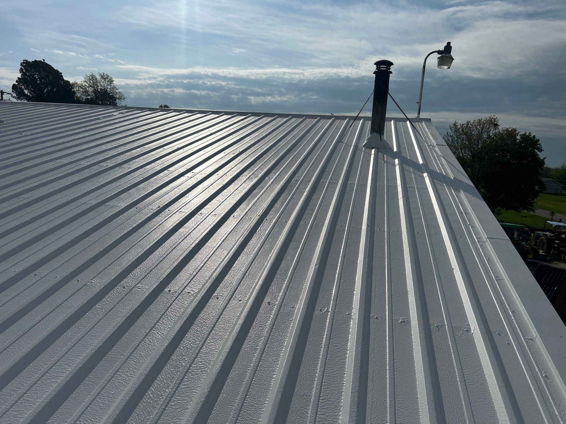 Commercial Metal Roofing Restoration using Coatings by Kentucky Commercial Roofing