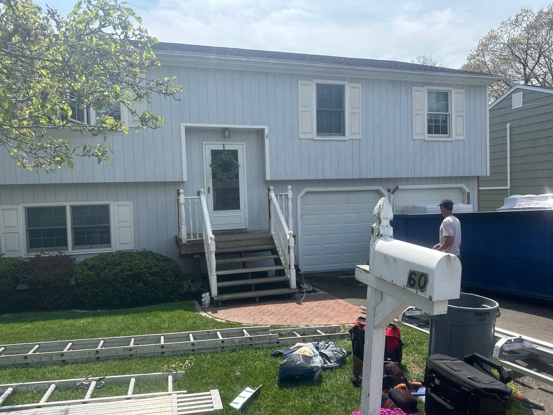 Siding Installation using Certainteed Cedar Impressions Straight Edge Perfection Shingles - D7 - Pacific Blue by A Plus Exterior