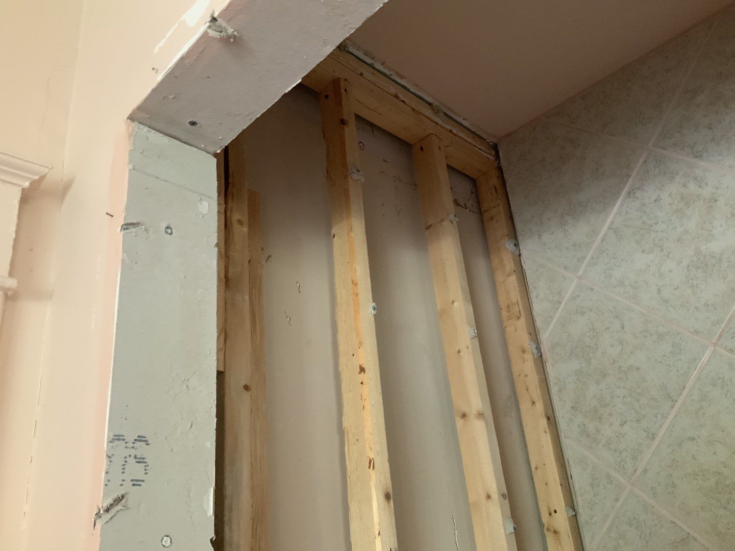 Bathroom Remodel using New Bathroom Tile and Tube by Alpha Design Services