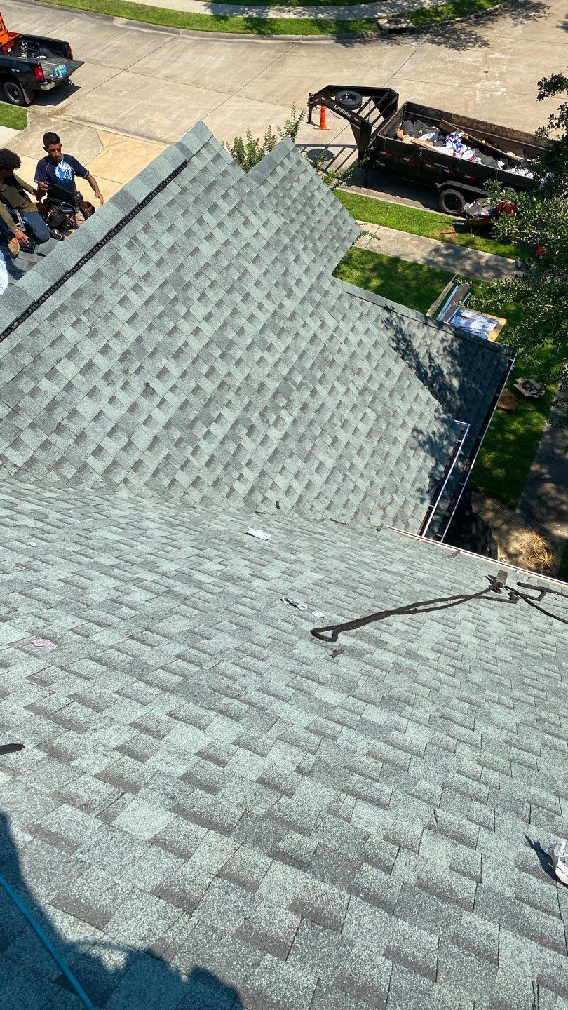 Residential Roofing Installation using Roof Replacement by American Roofing & Construction LLC
