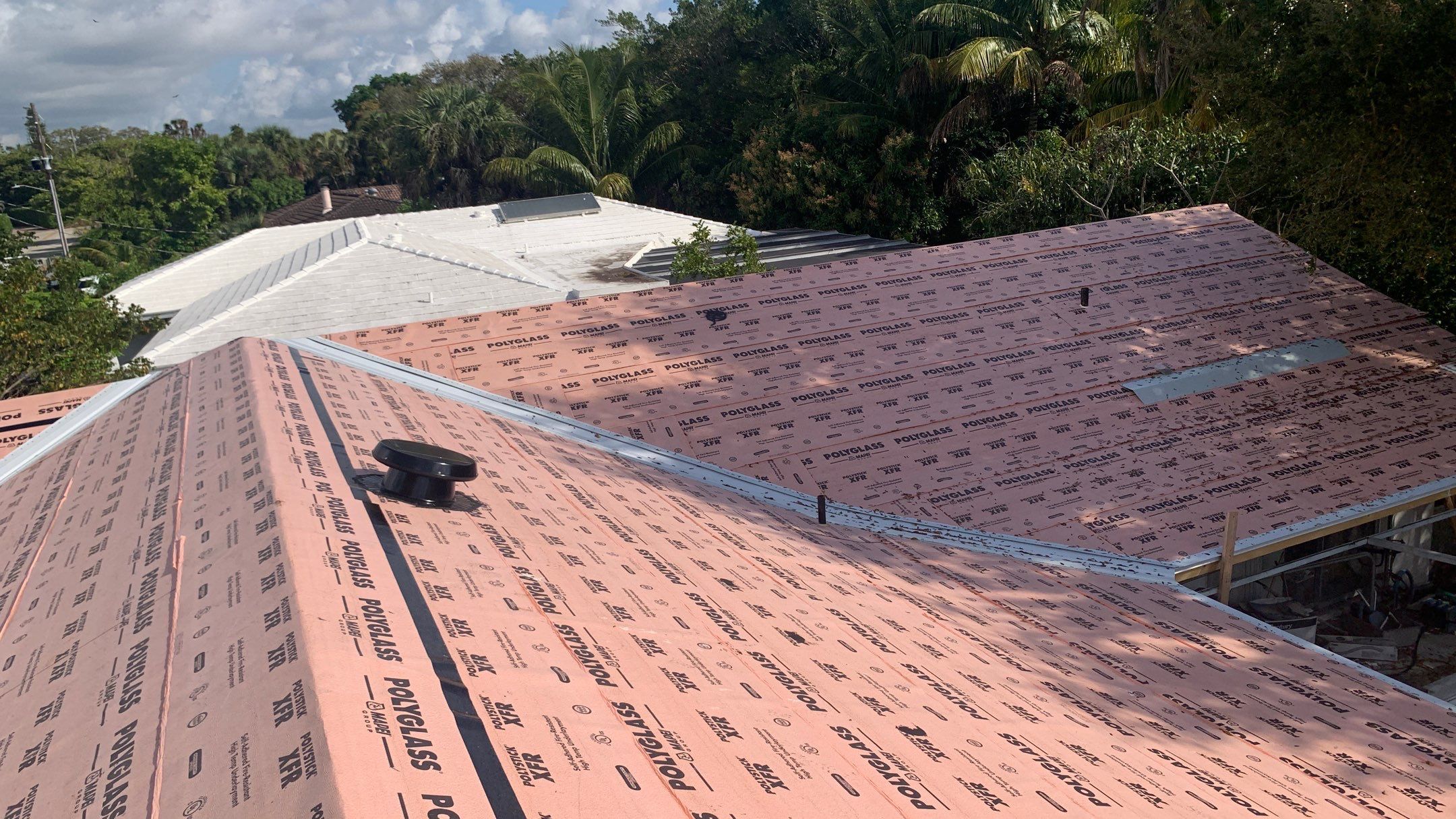 Residential Roofing Installation using 1" Nail strip metal roof by BLUES BROTHERS ROOFING