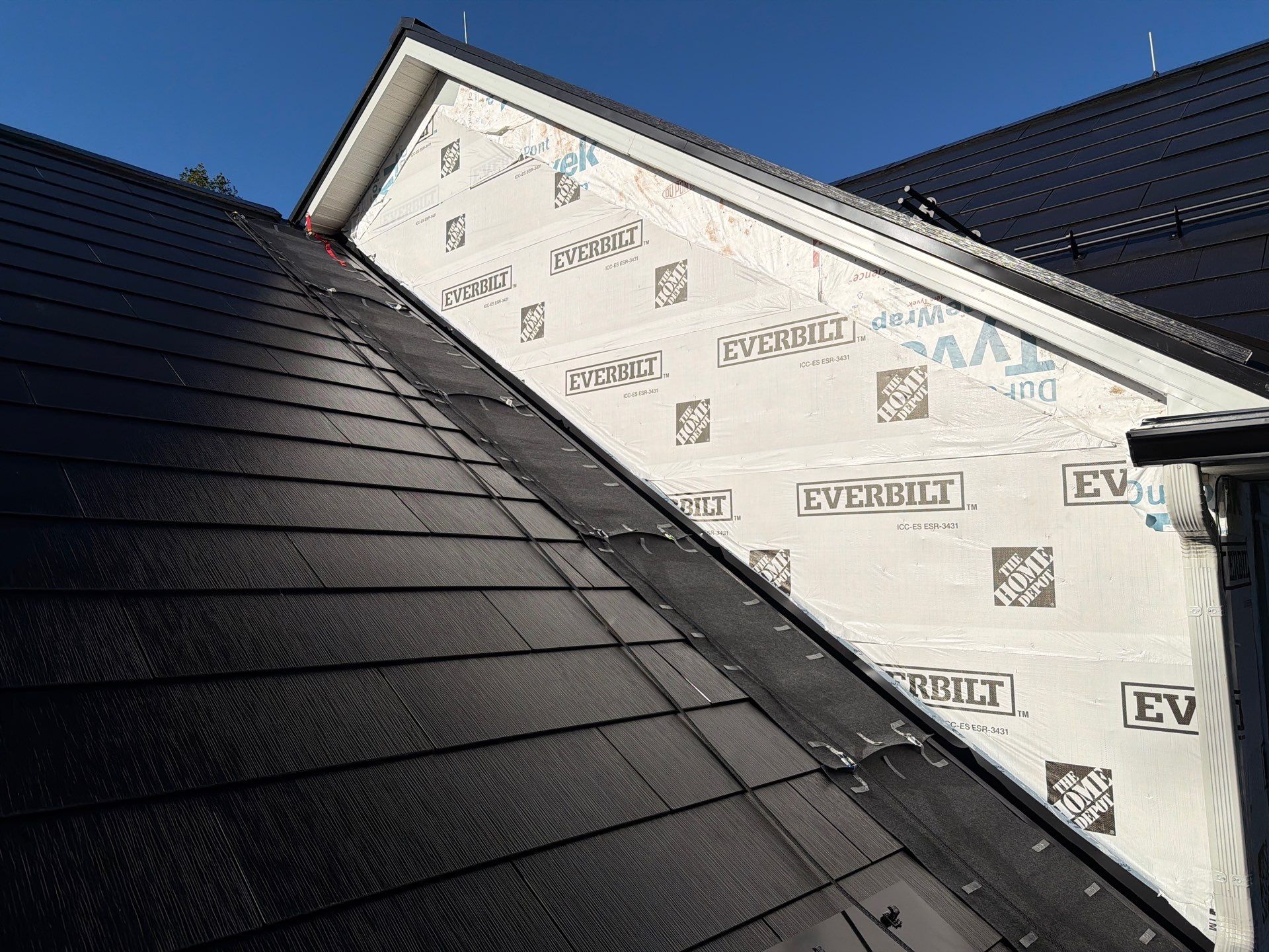 Beautiful James Hardie Siding & Tesla Solar Roof by American Home Contractors