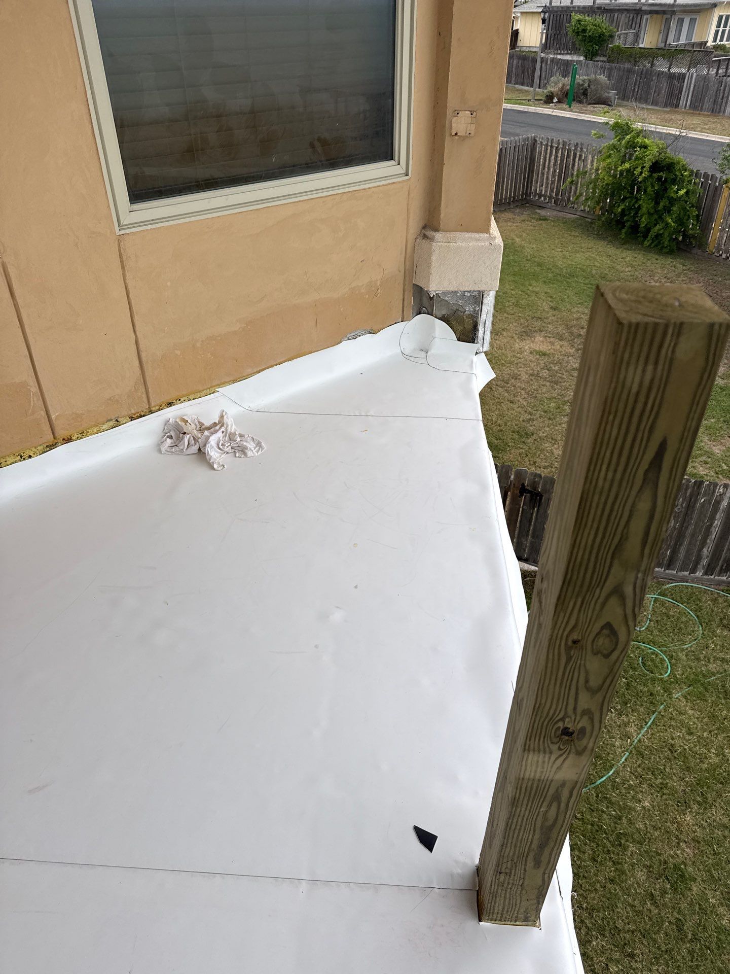 Walk Out Patio Cover by Bayfront Roofing and Construction