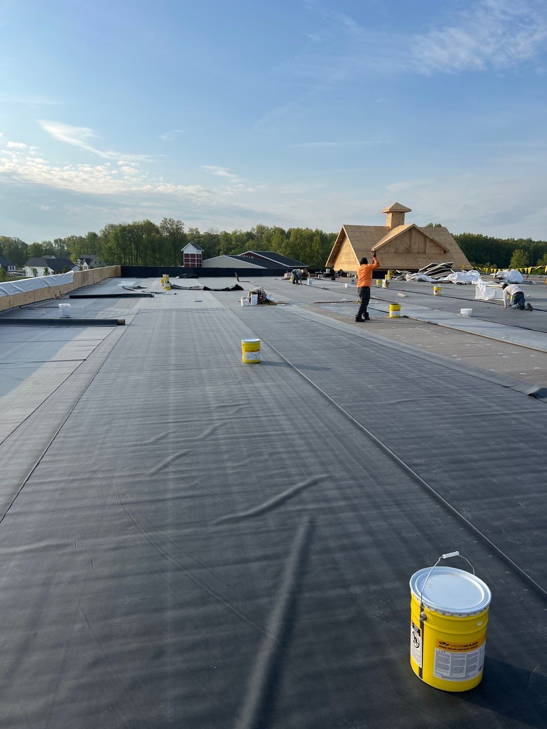 Commercial Roofing Installation using 60 mil rubber roof  by Nitro Roofing and Construction