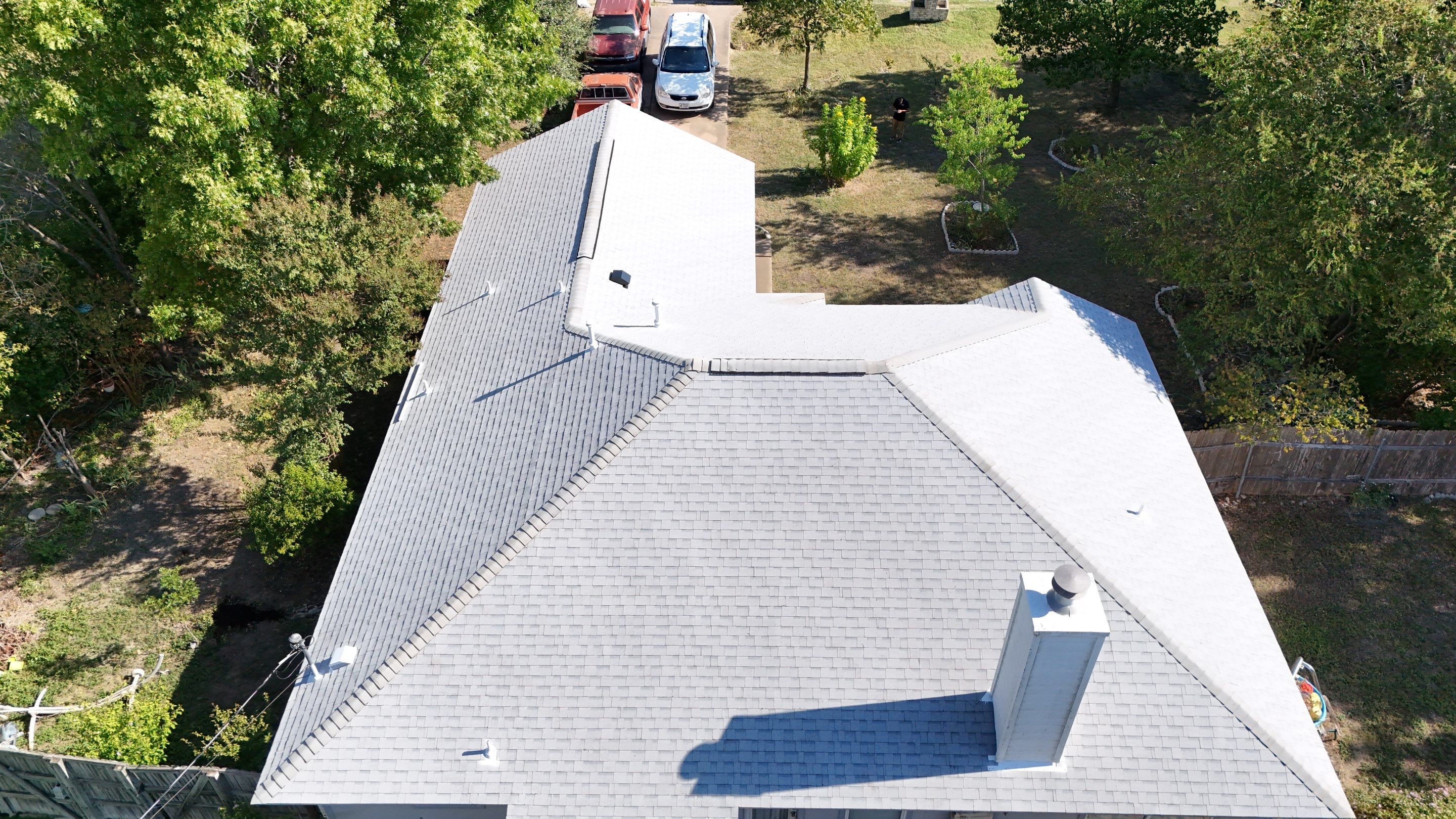 Residential Roof Replacement using Owens Corning - Duration - Shasta White by Action Exteriors Austin