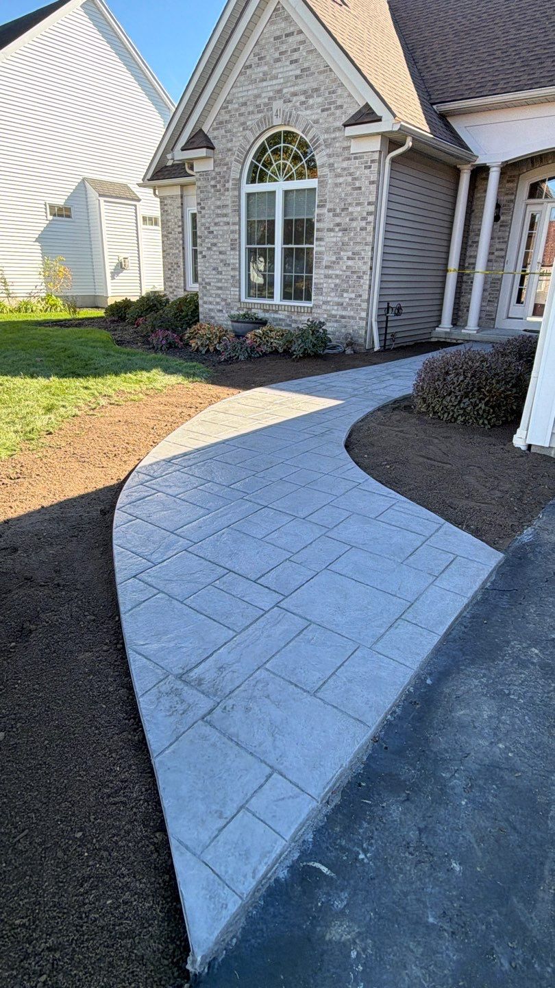 Ashler Slate Stamped Patio by NG Masonry & Construction LLC