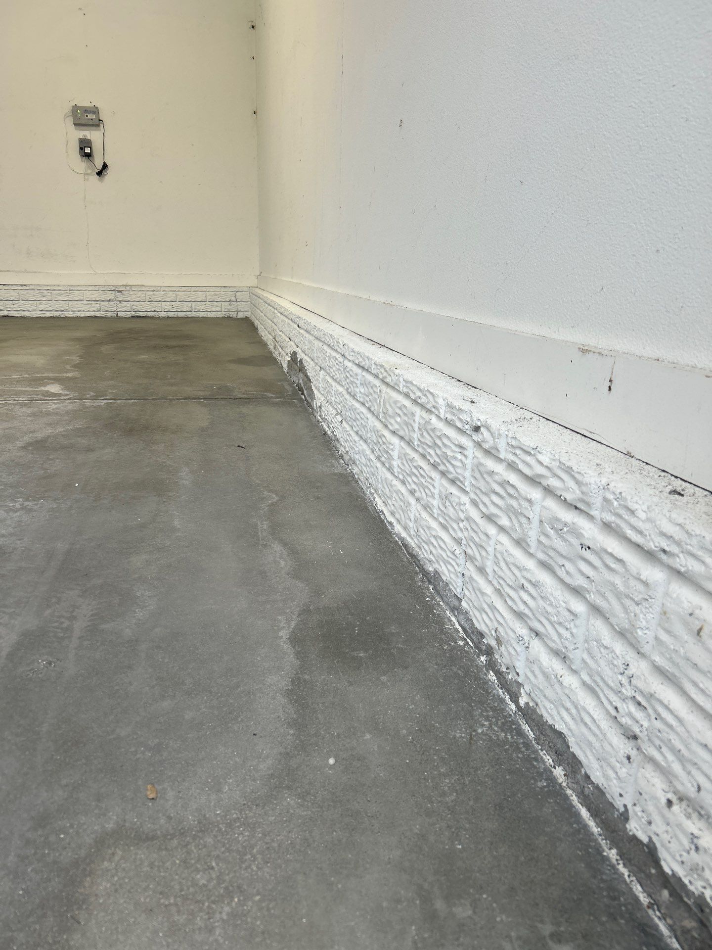 Garage Floor Coating using Domino Flake by Revival Concrete Coatings