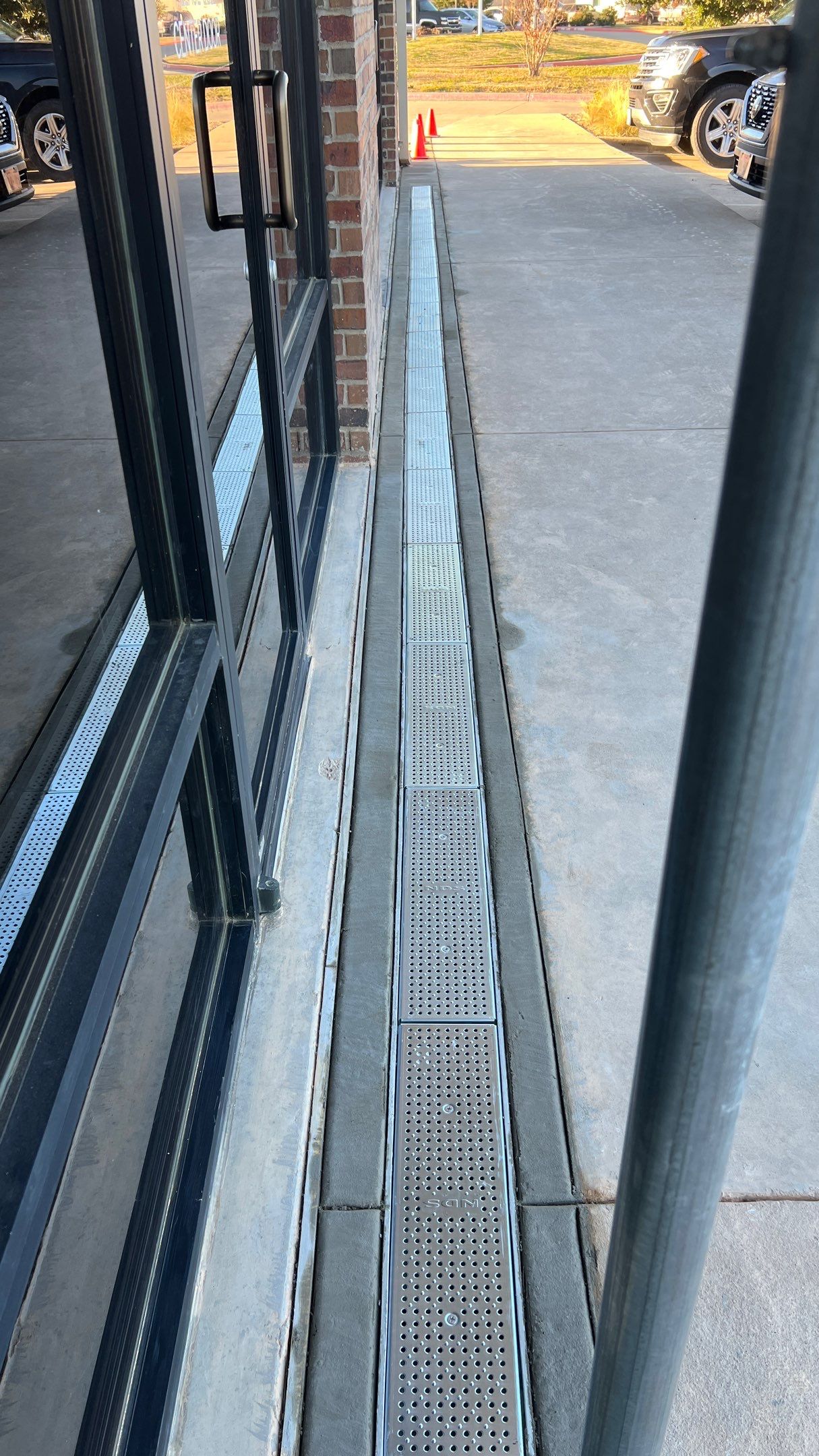 Drainage System Installation and Metal Roof Repairs by Harvey Roofing & Construction