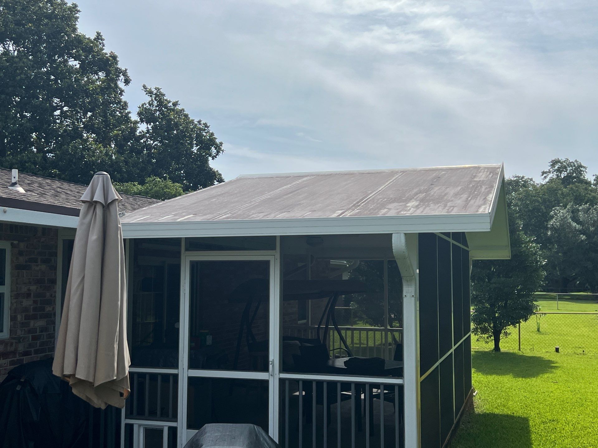 Enclosure with Vinyl Windows using Colorbeam by Titan Sunrooms