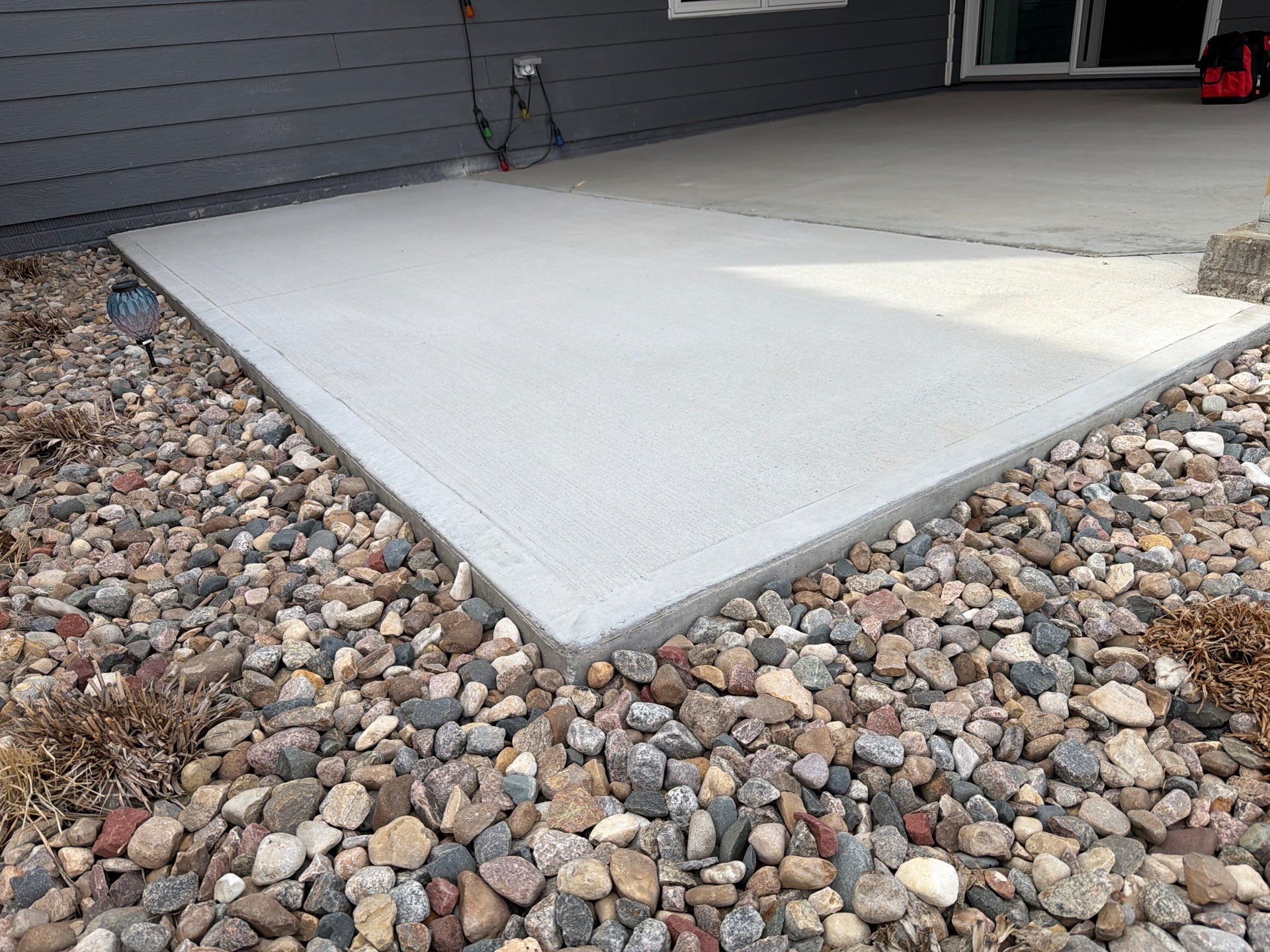 Decorative Flake Concrete Coating for Sioux Falls Porch and Patio by Select Painting, Coatings & Garage Cabinets