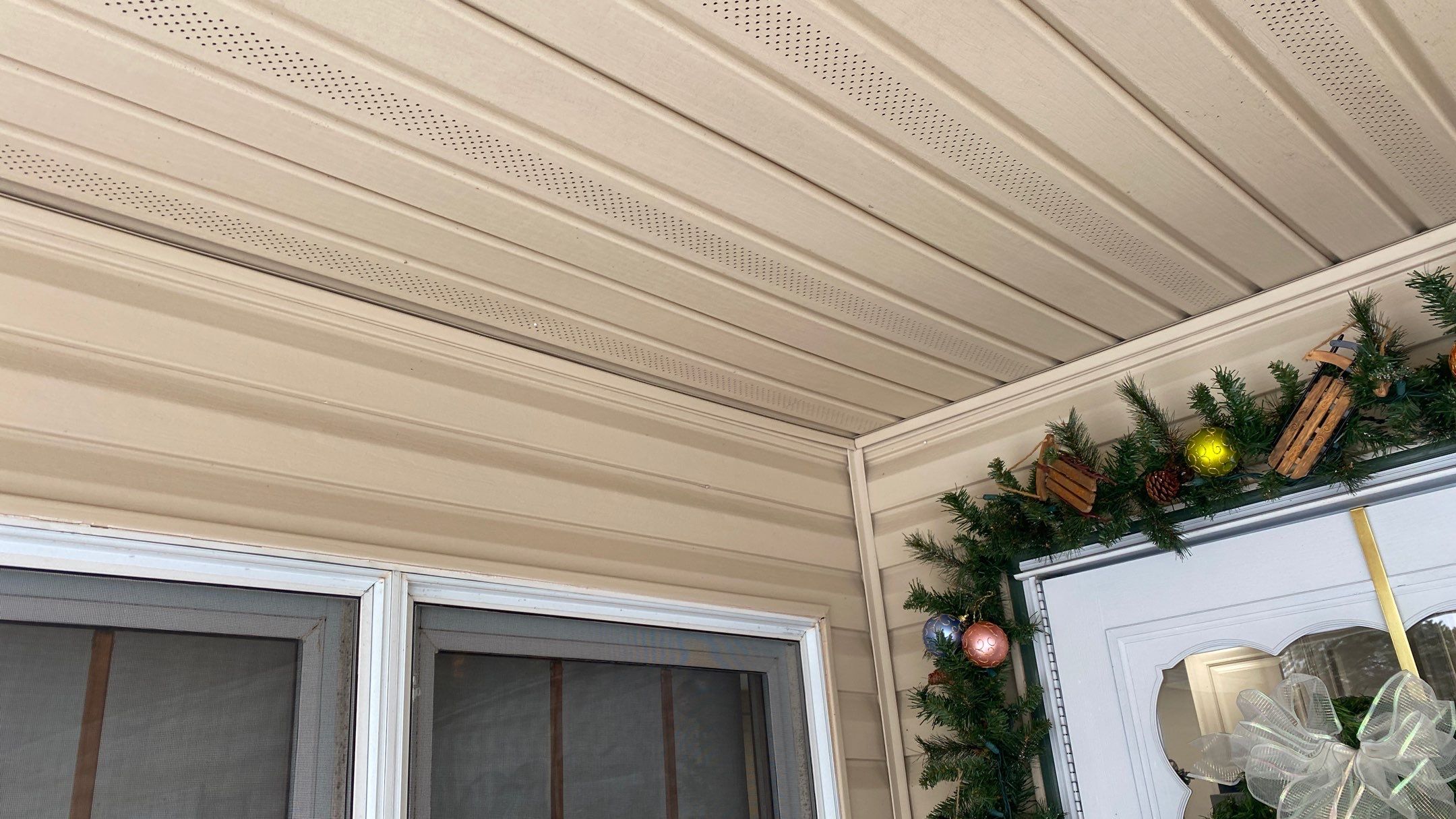 Exterior remodel including window replacement by American Home Contractors