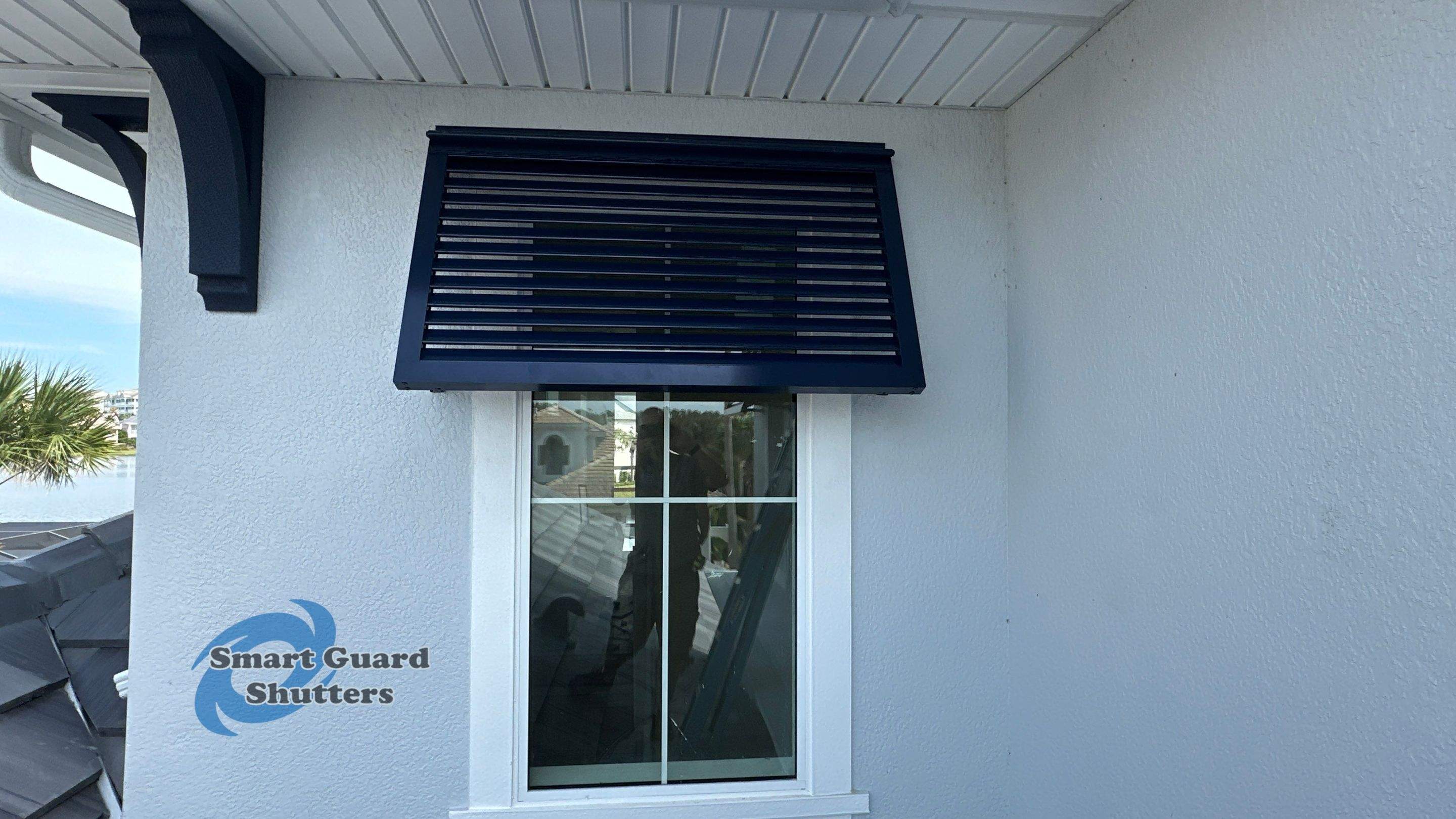 Decorative Bahamas in Steel Blue by Smart Guard Shutters