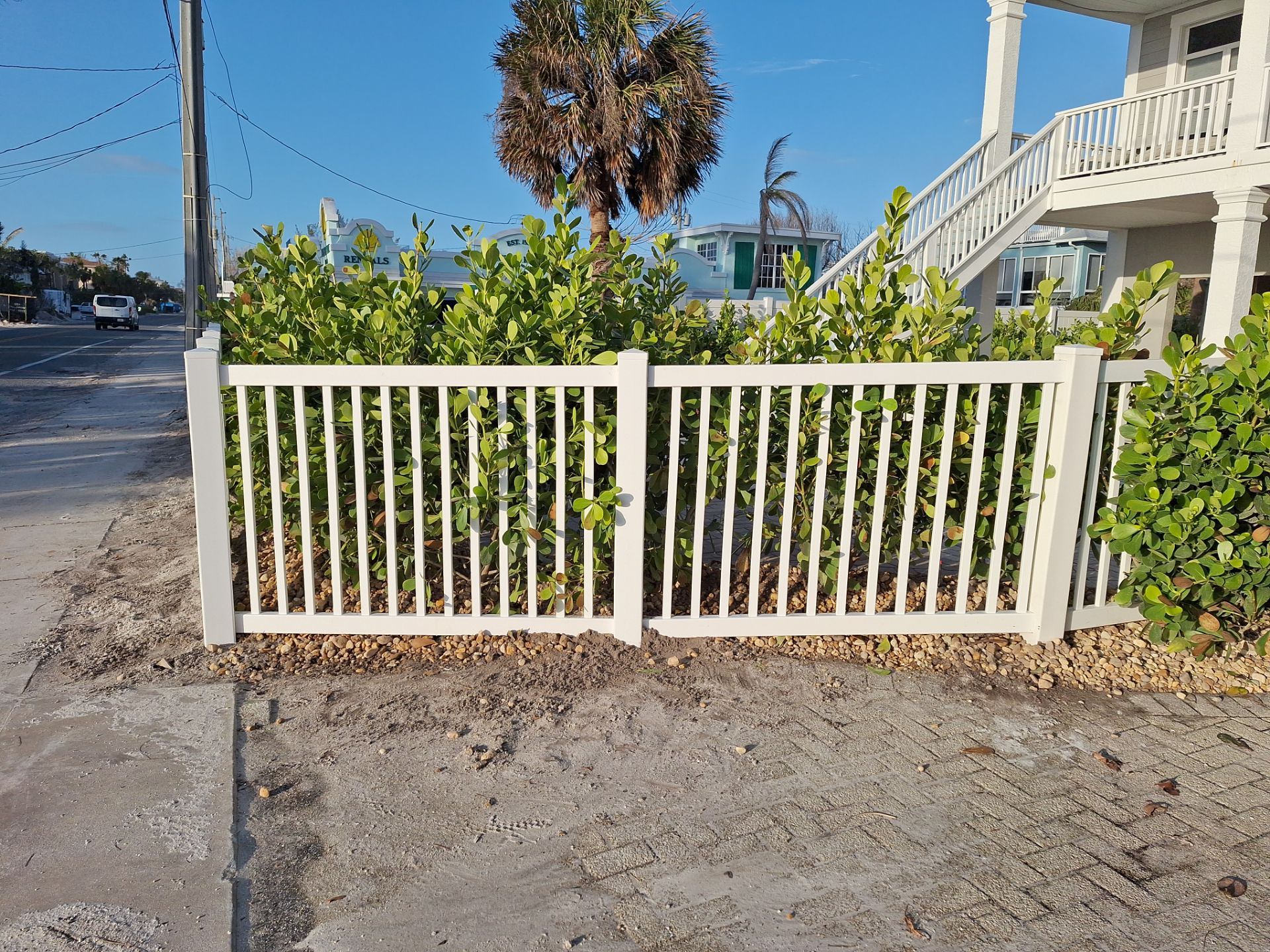 Vinyl Fence Installation using 6Ft Vinyl Privacy Fence with a 4Ft White Picket Fence by Asap fence and gates, LLC