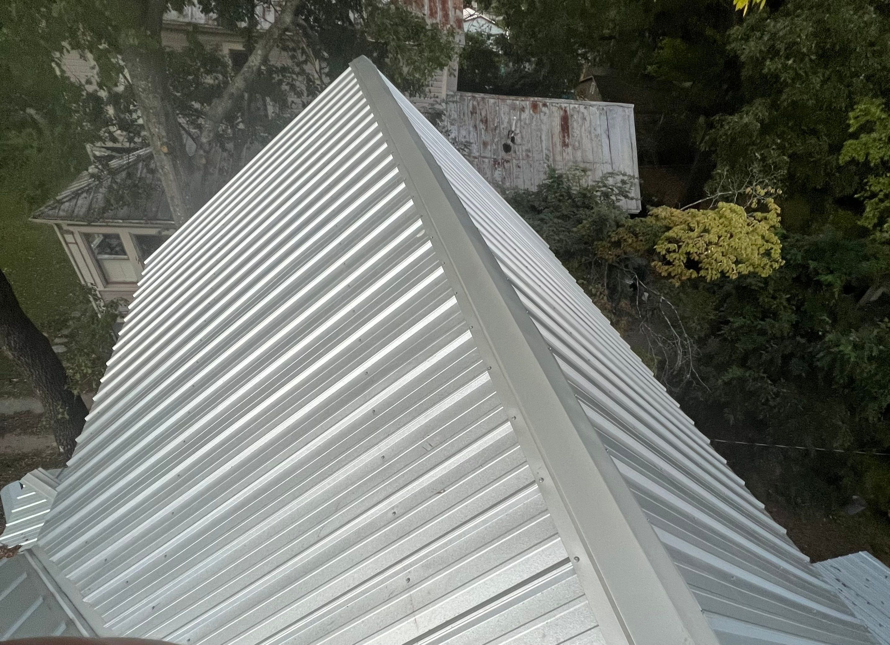 Residential Roofing Installation using 26 Gauge Metal by The Roofing Dudes