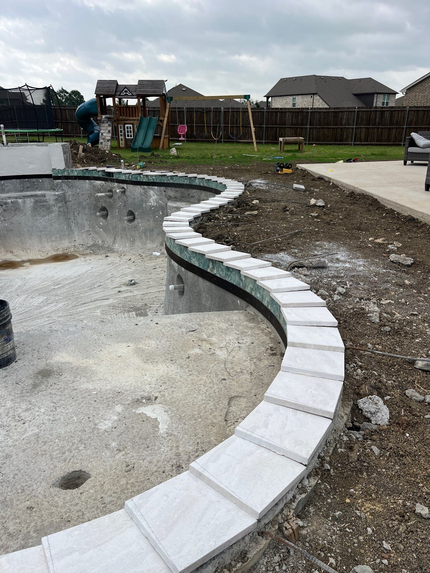 Freeform Pool with Raised Spa and Fire Feature by Pinnacle Pools and Spas - DFW