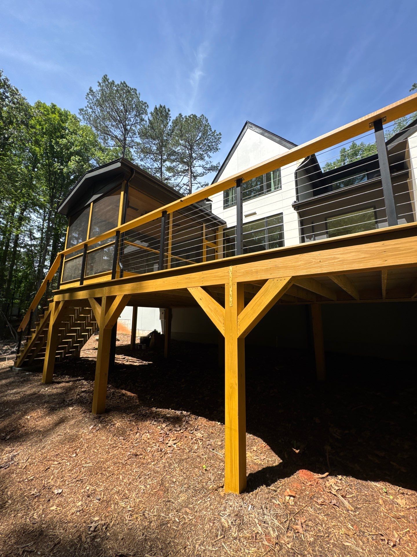 Porch and Deck staining  by GonzalezPainters & Contractors Inc 