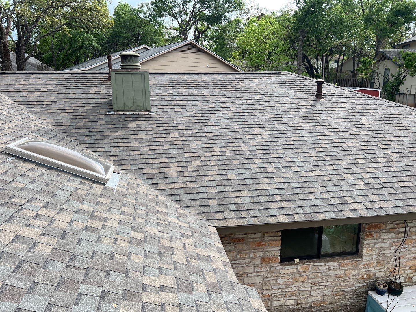 Winter storm 2023 with tree damage by Oakwood Roofing and Construction, LLC