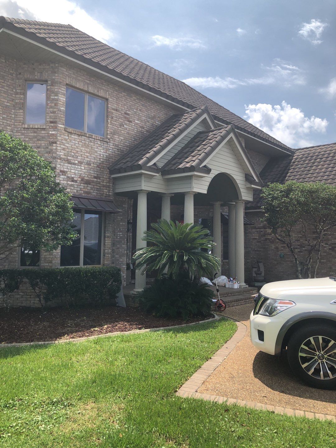 Seamless Gutter Installation with Wicker Color K-Style Gutters and LeafBlaster Pro Mesh Gutter Guards by Gutter Professors
